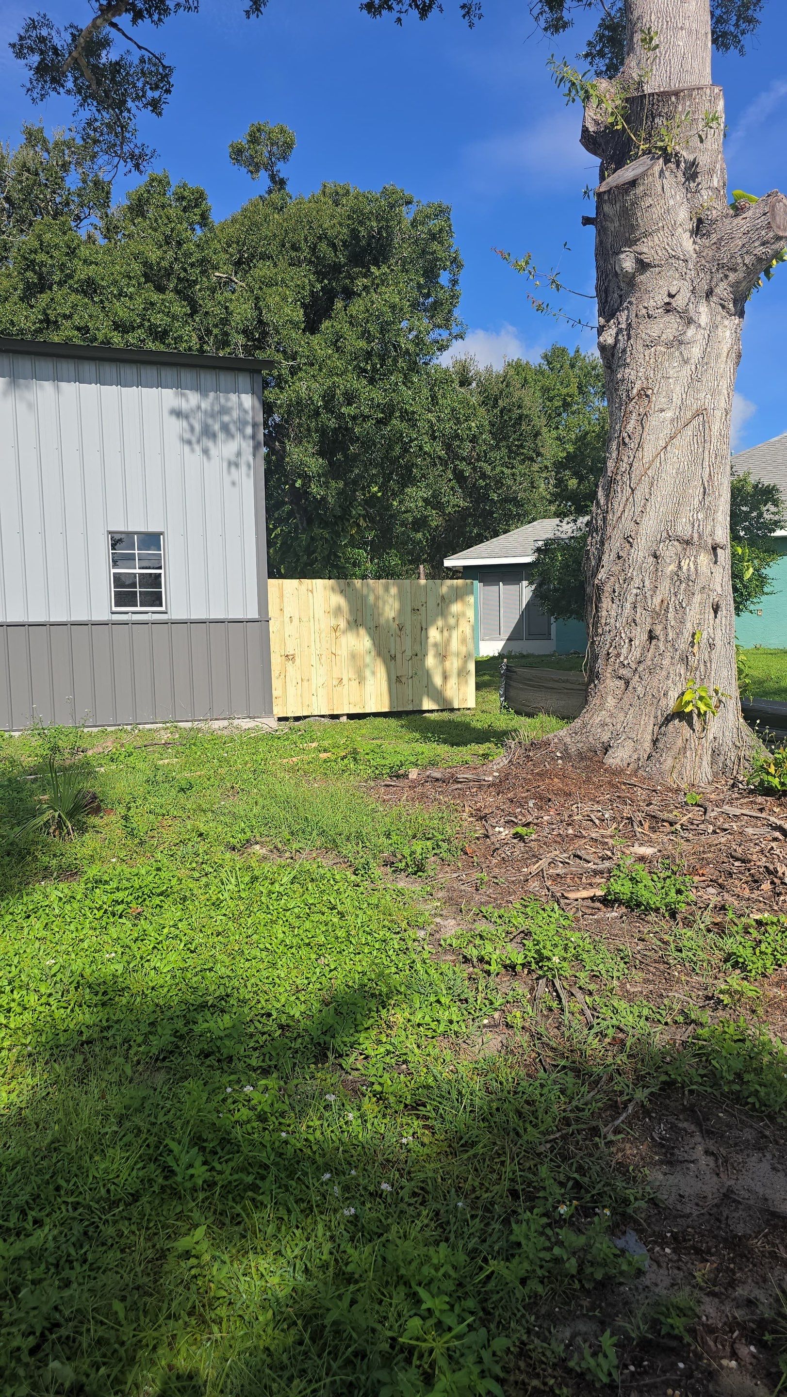 Pressure-Treated Wood Privacy Fence and Gate Installation in North Port by True Fence LLC