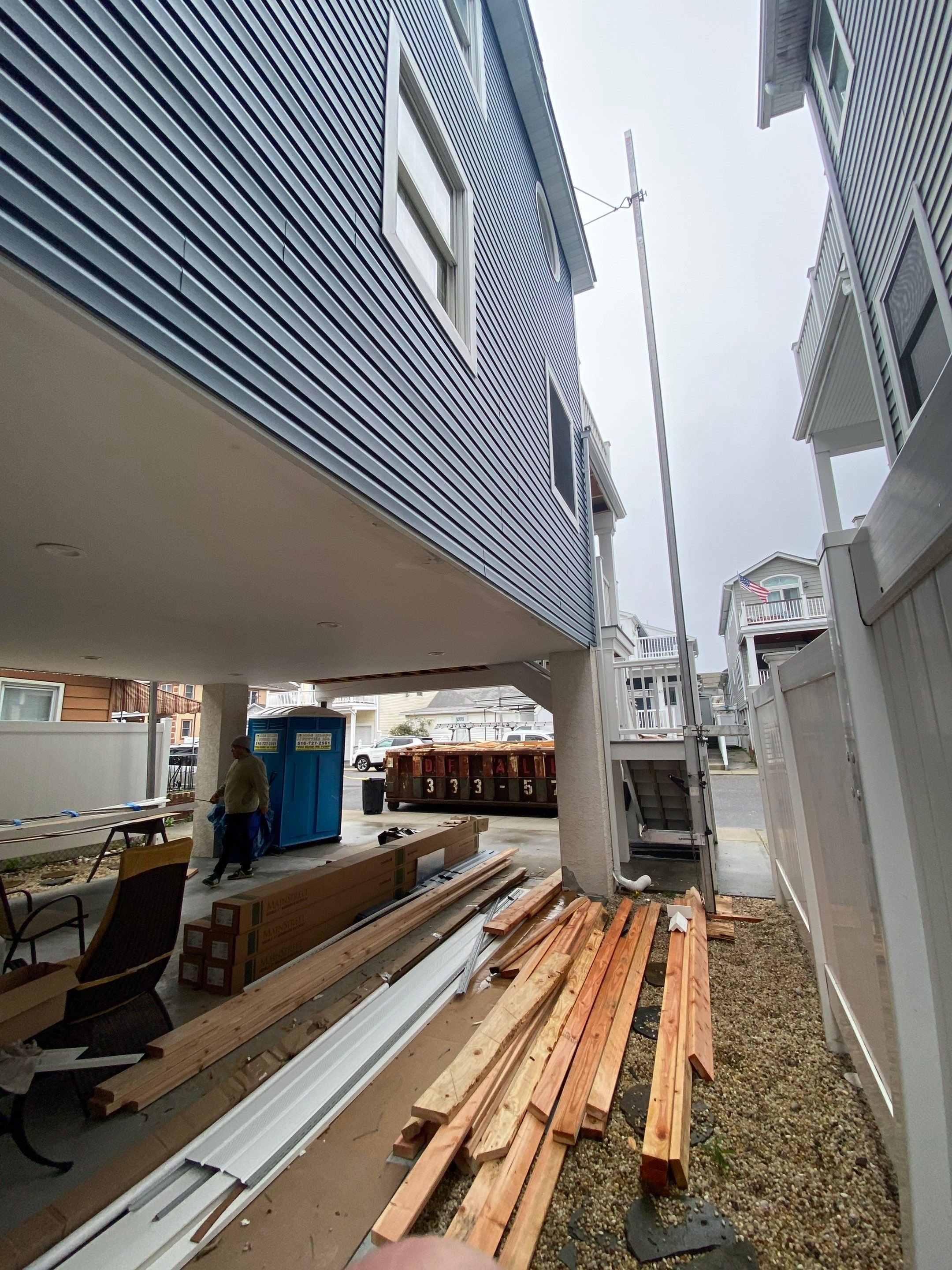 House lift in the westend of Long Beach.  by Above All Gutters 