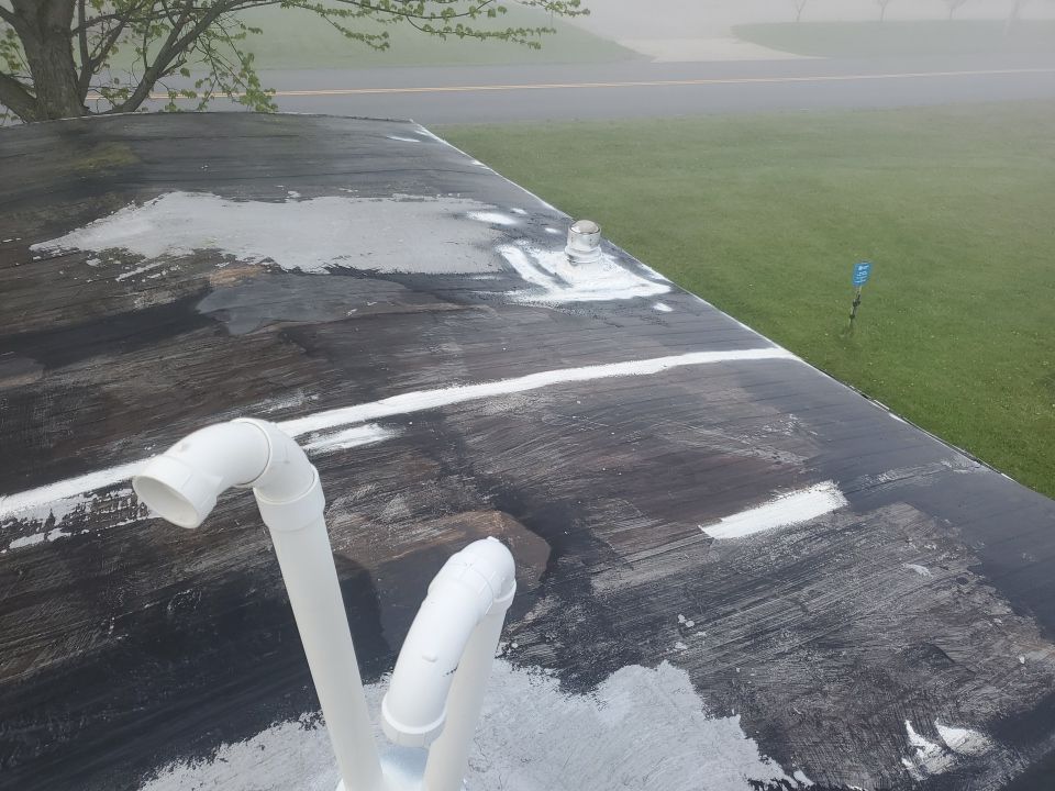 Residential Roofing Installation using 60 mil rubber roof  by Nitro Roofing and Construction