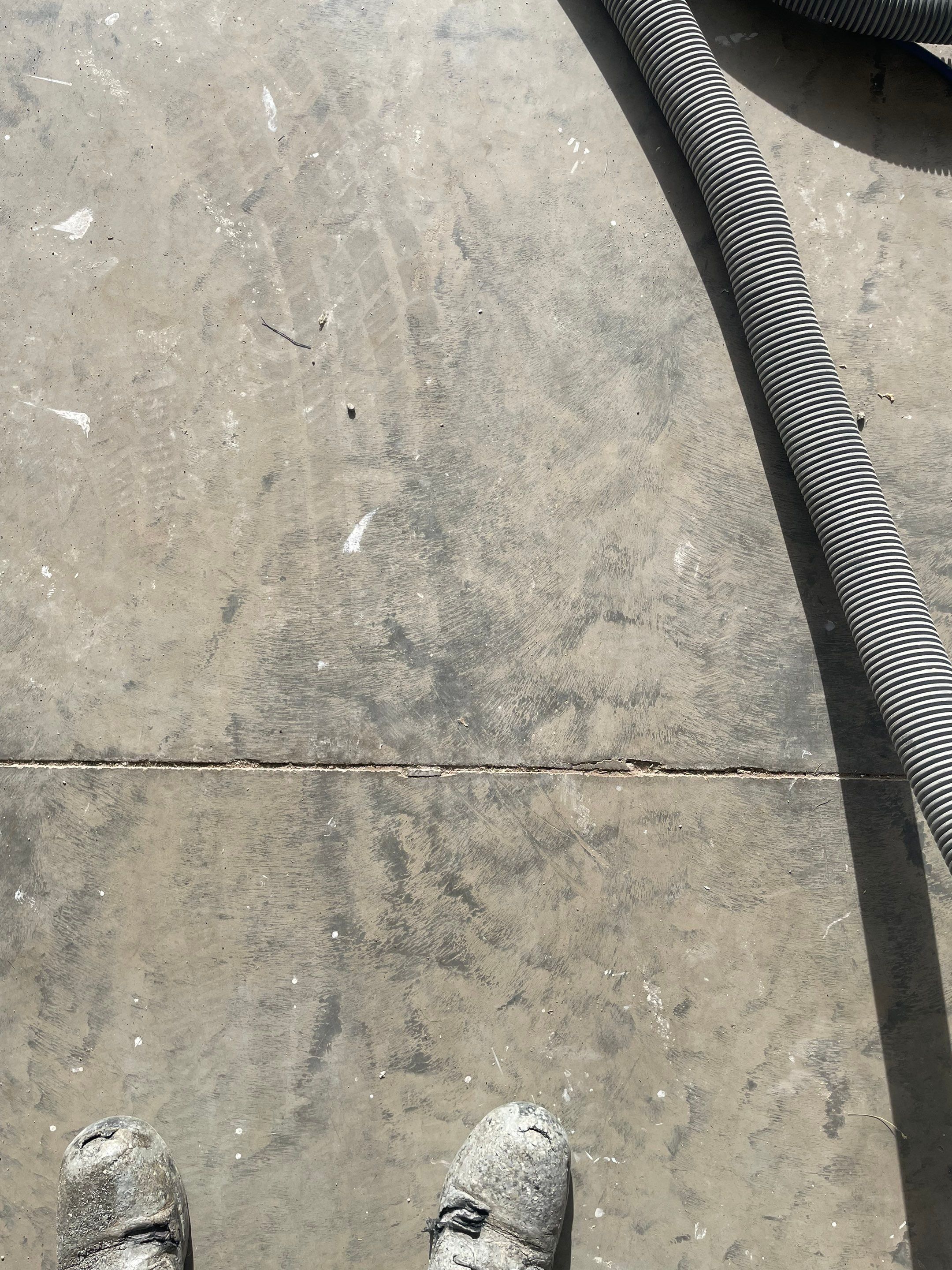 Sioux Falls Garage Floor Transformation with Cabin Fever Decorative Chips by Select Painting, Coatings & Garage Cabinets
