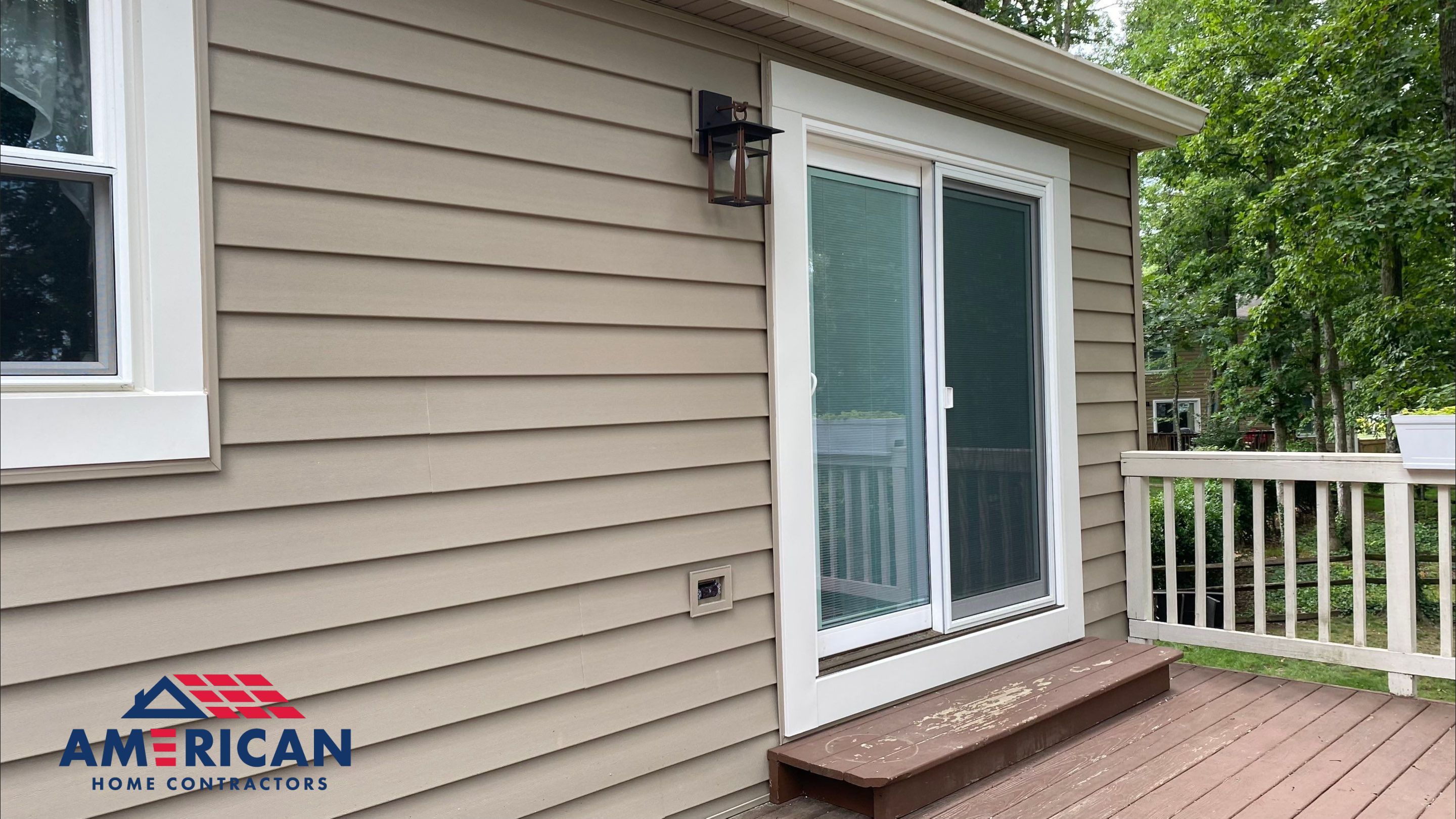 Mastic Siding + Interstate Windows by American Home Contractors