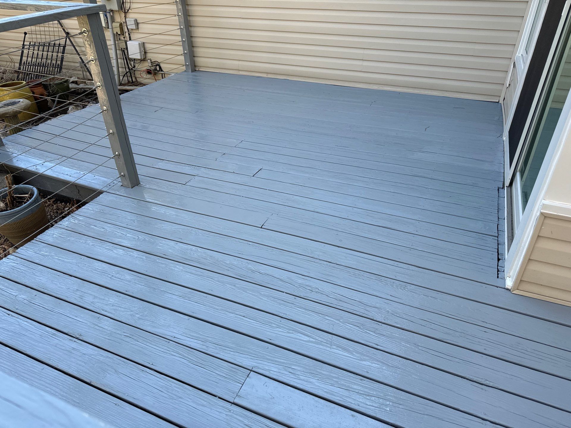 Deck staining by GonzalezPainters & Contractors Inc 