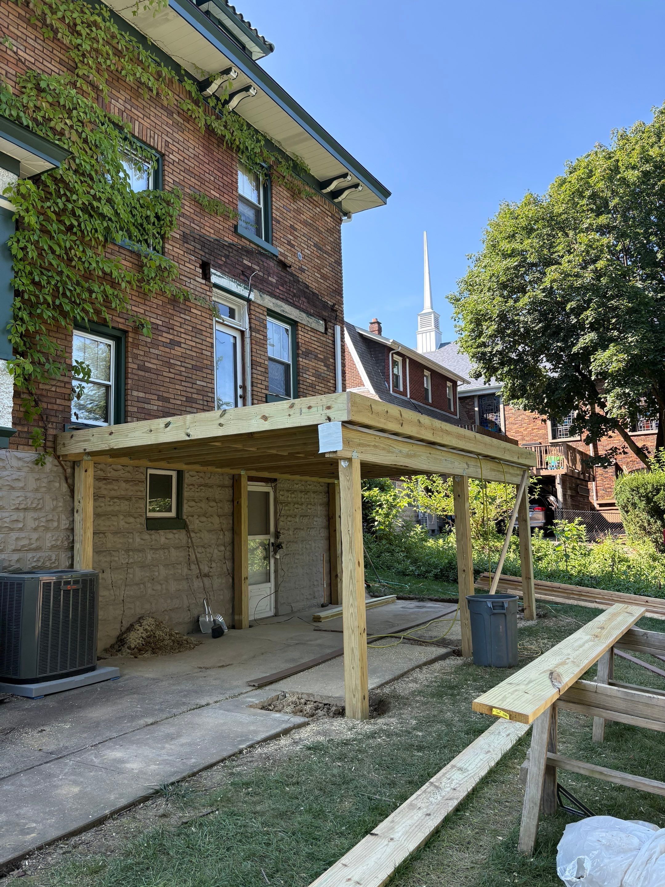 Deck and Roof build  by Cousins Roofing Siding & Decks