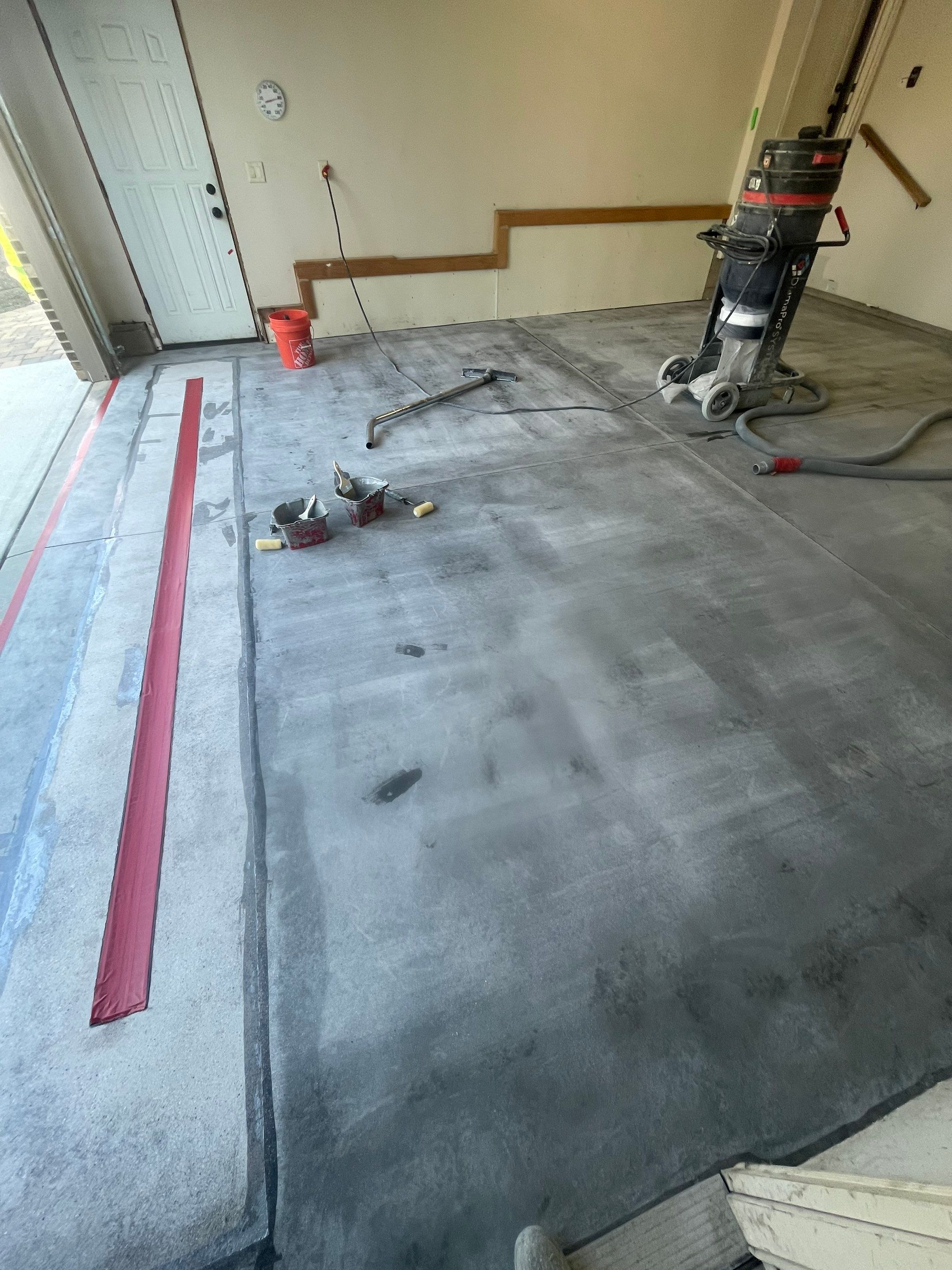 Multi-Stall Garage Floor Coating Installation in Sioux Falls by Select Painting, Coatings & Garage Cabinets