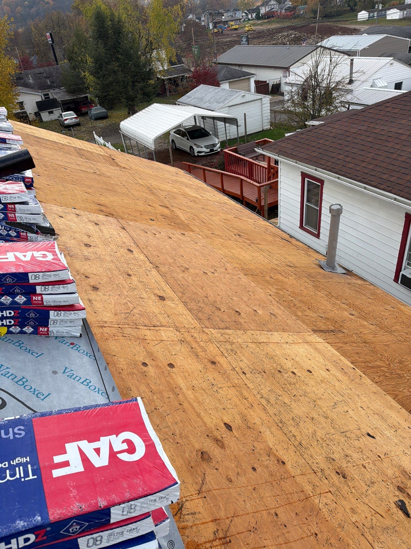 Residential Roofing Installation using GAF Timberline HDZ Oyster Grey by Rainstoppers Roofing