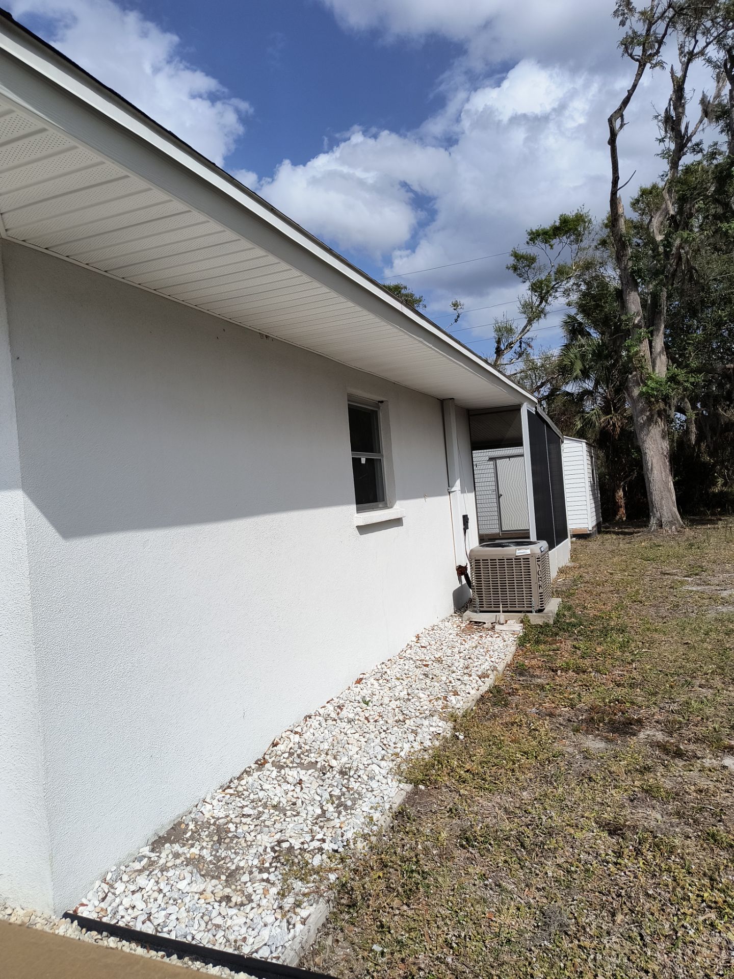 Soffit and Fascia Installation using White Soffit in Sarasota Fl by Gutter Professors