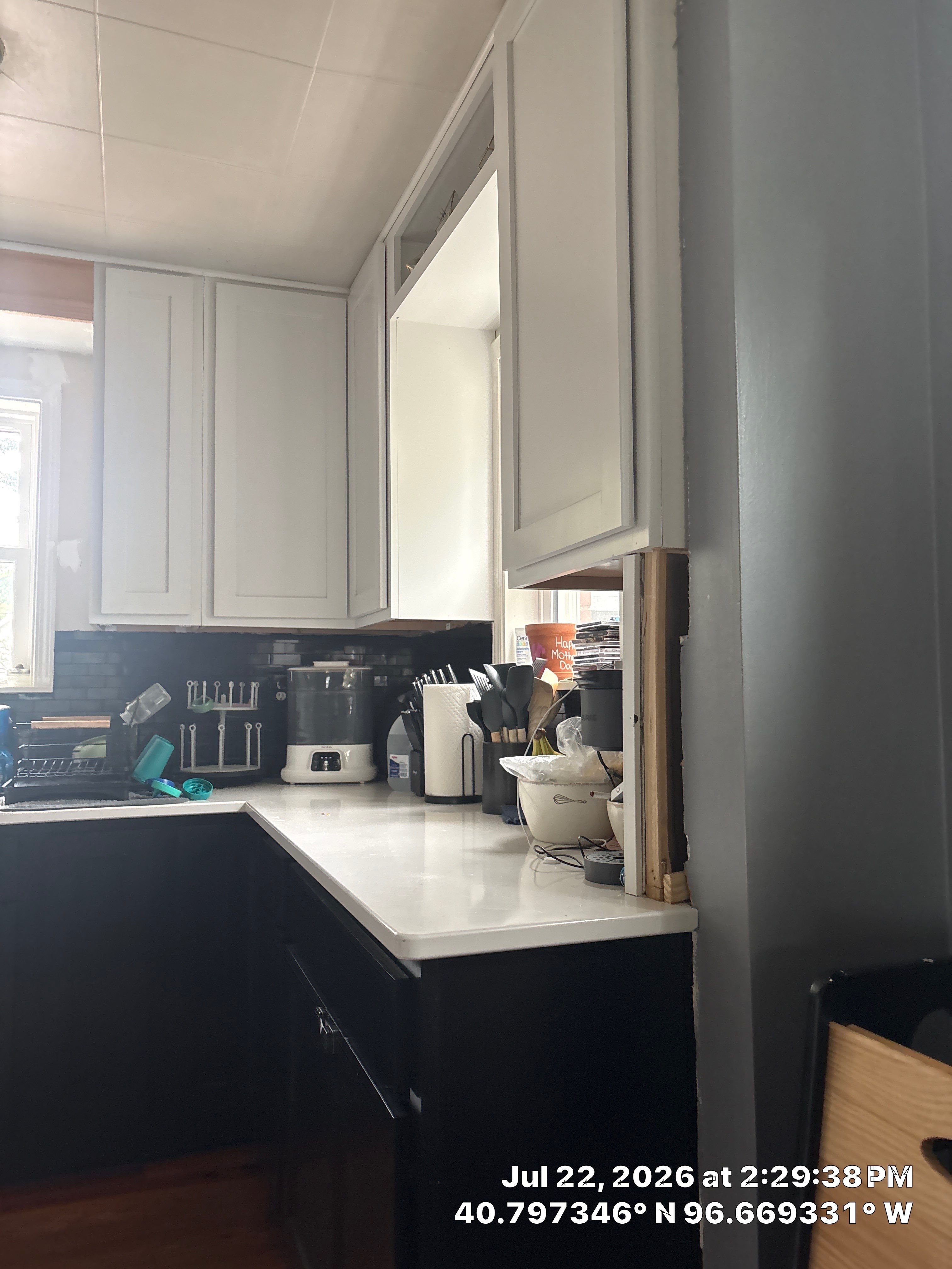 Modern Kitchen Renovation with Two-Tone Cabinetry and Quartz Countertops by CompanyCam Sales Demo