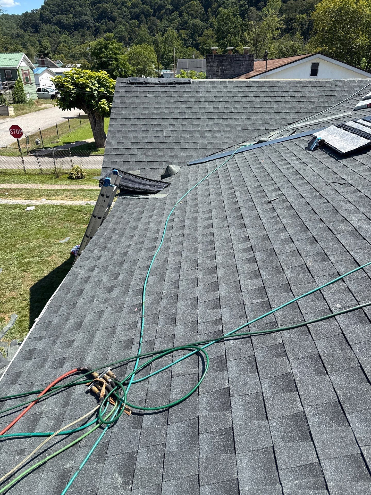 Residential Roofing Installation using GAF Timberline HDZ Charcoal by Rainstoppers Roofing