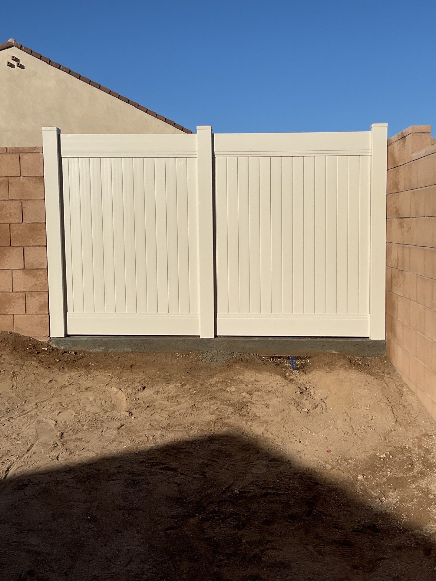 Gate installation using Vinyl by Fence Guys Inc.