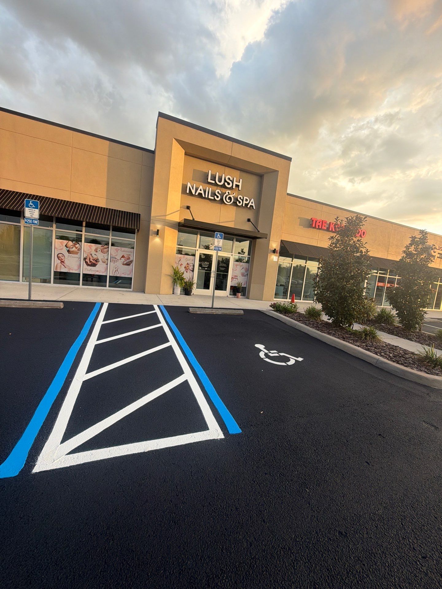 Commercial Asphalt Sealcoating and Line Striping at School House Plaza by Everline Coatings & Services - Southwest FL