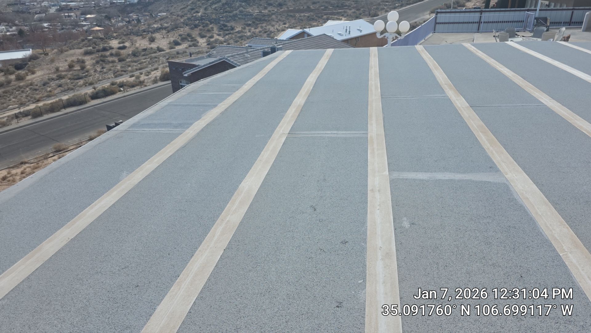 La Bajada Ct NW • Albuquerque, NM 87105 by Doyle Roof Masters Inc