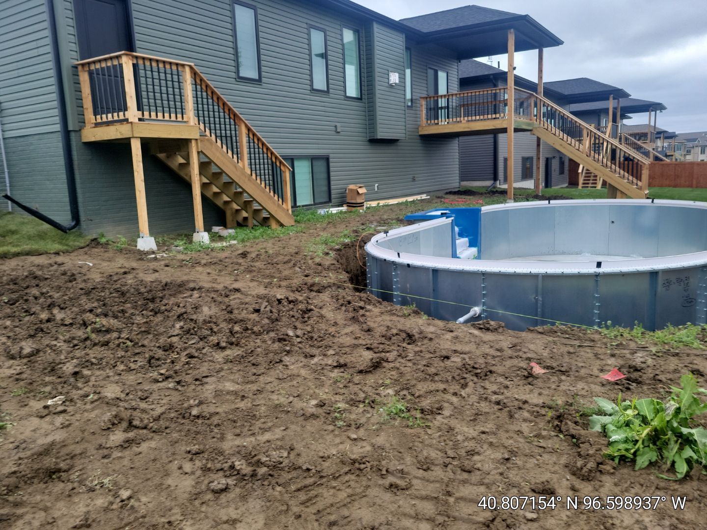 New Residential Construction - Paver, Putting Green, Pool by New Horizon Landscapes