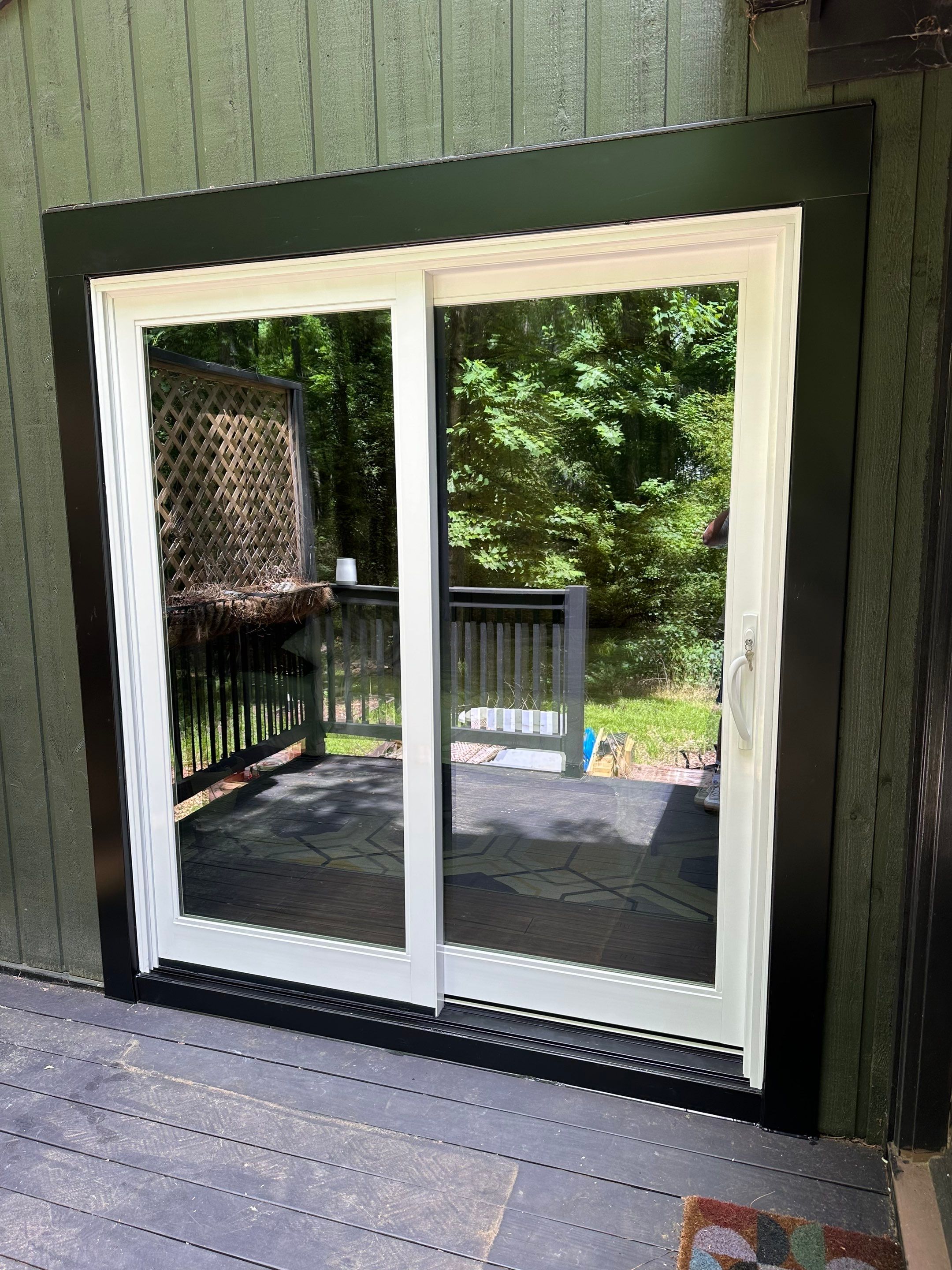 White Vinyl Sliding Glass Door Replacement in Cary, North Carolina by The Remodeling Company