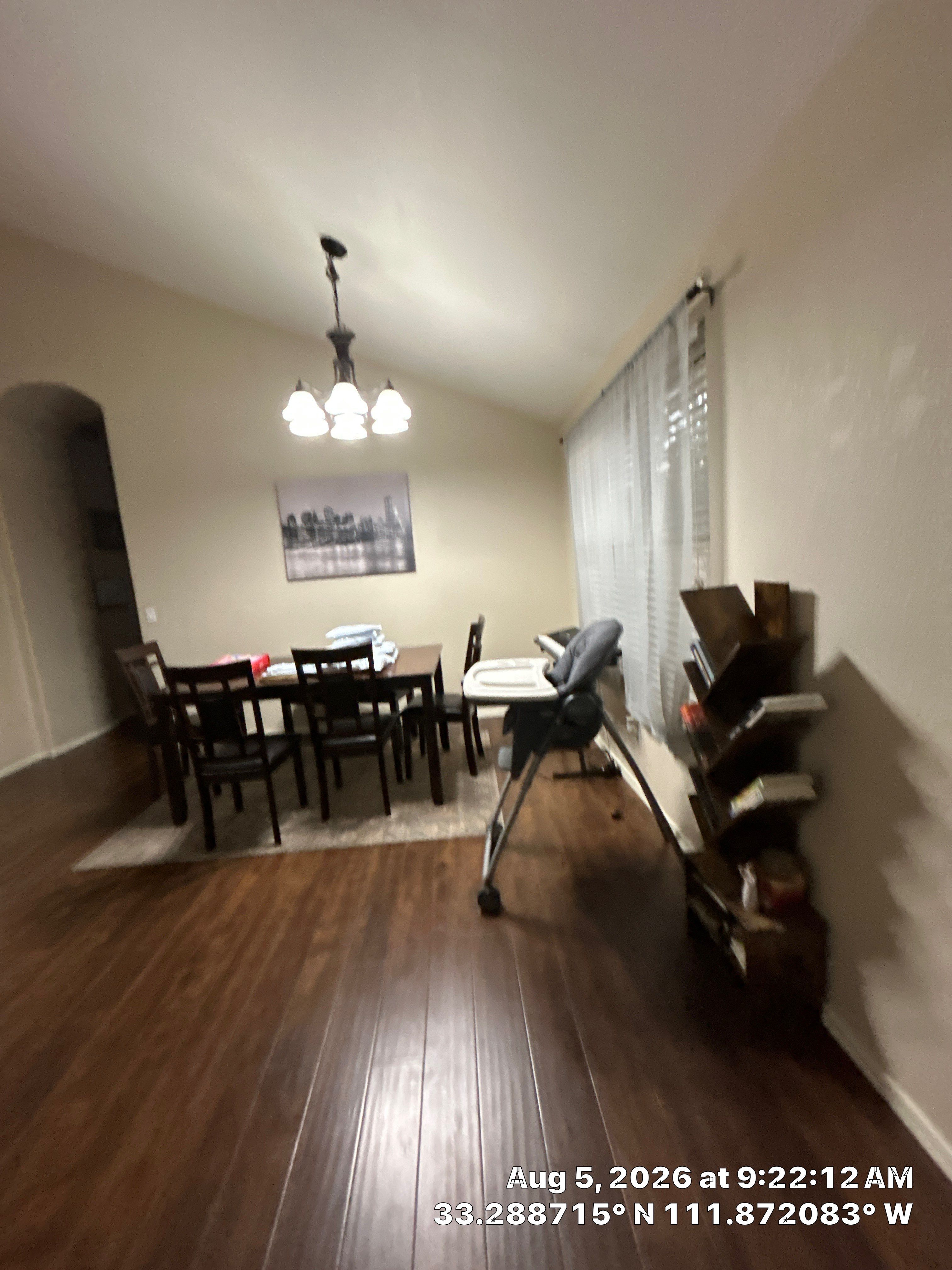 Modern Dining Room Renovation With Dark Wood Flooring in Chandler by CompanyCam Sales Demo
