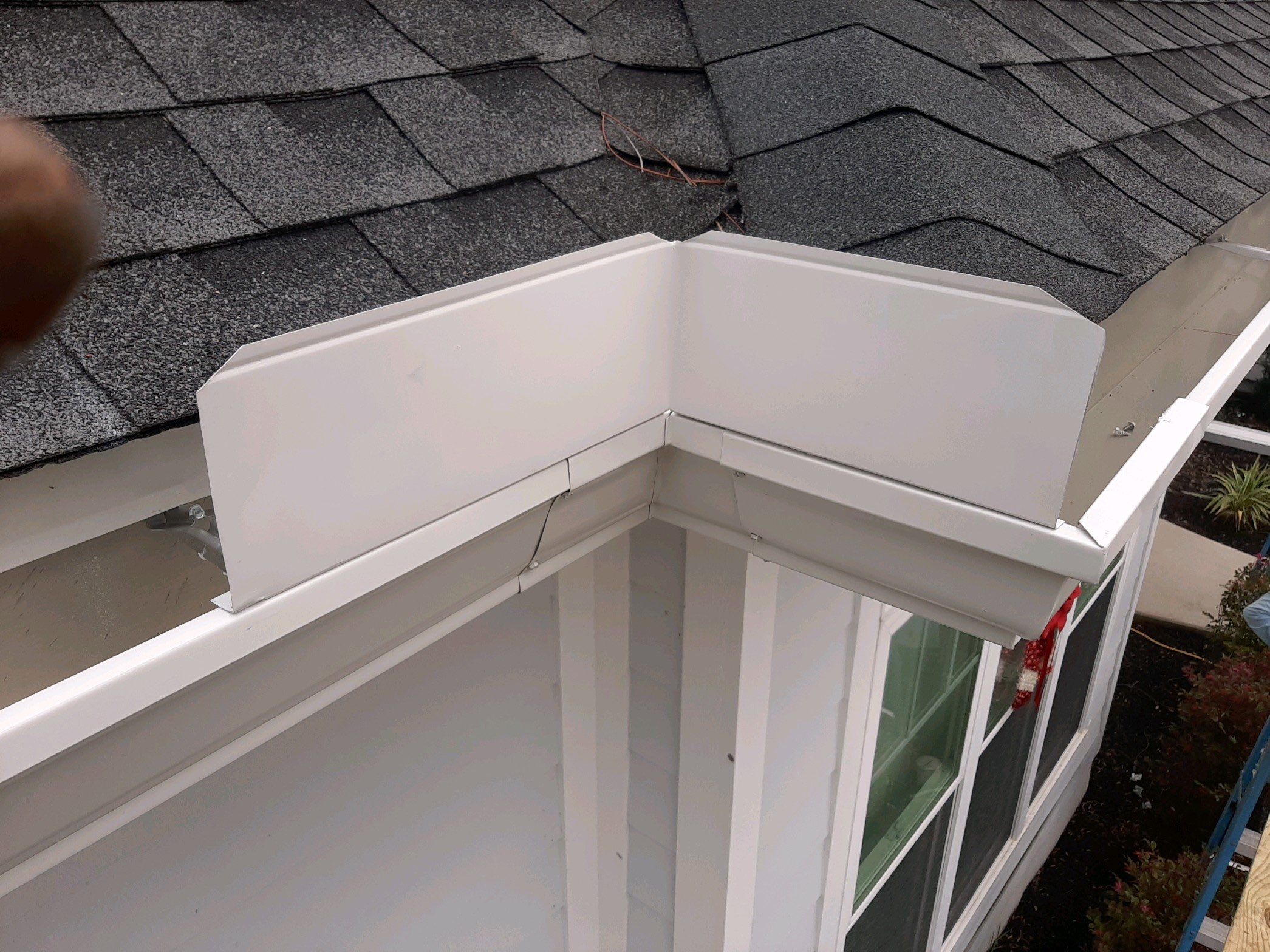 Gutter Installation using White K-Style Seamless Gutters by Gutter Professors