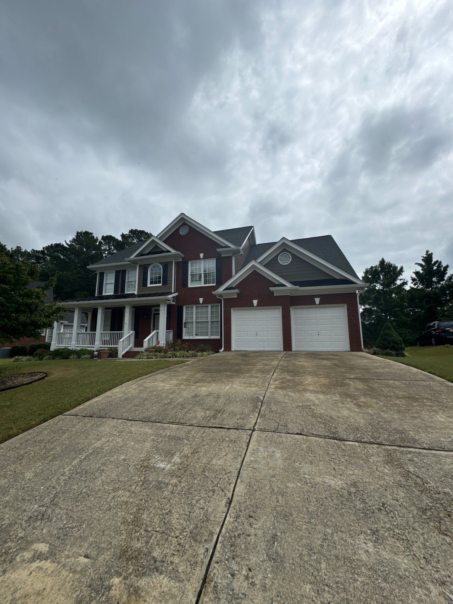 Exterior Painting and Gutter Replacement in Powder Springs by Swift Home Renovations