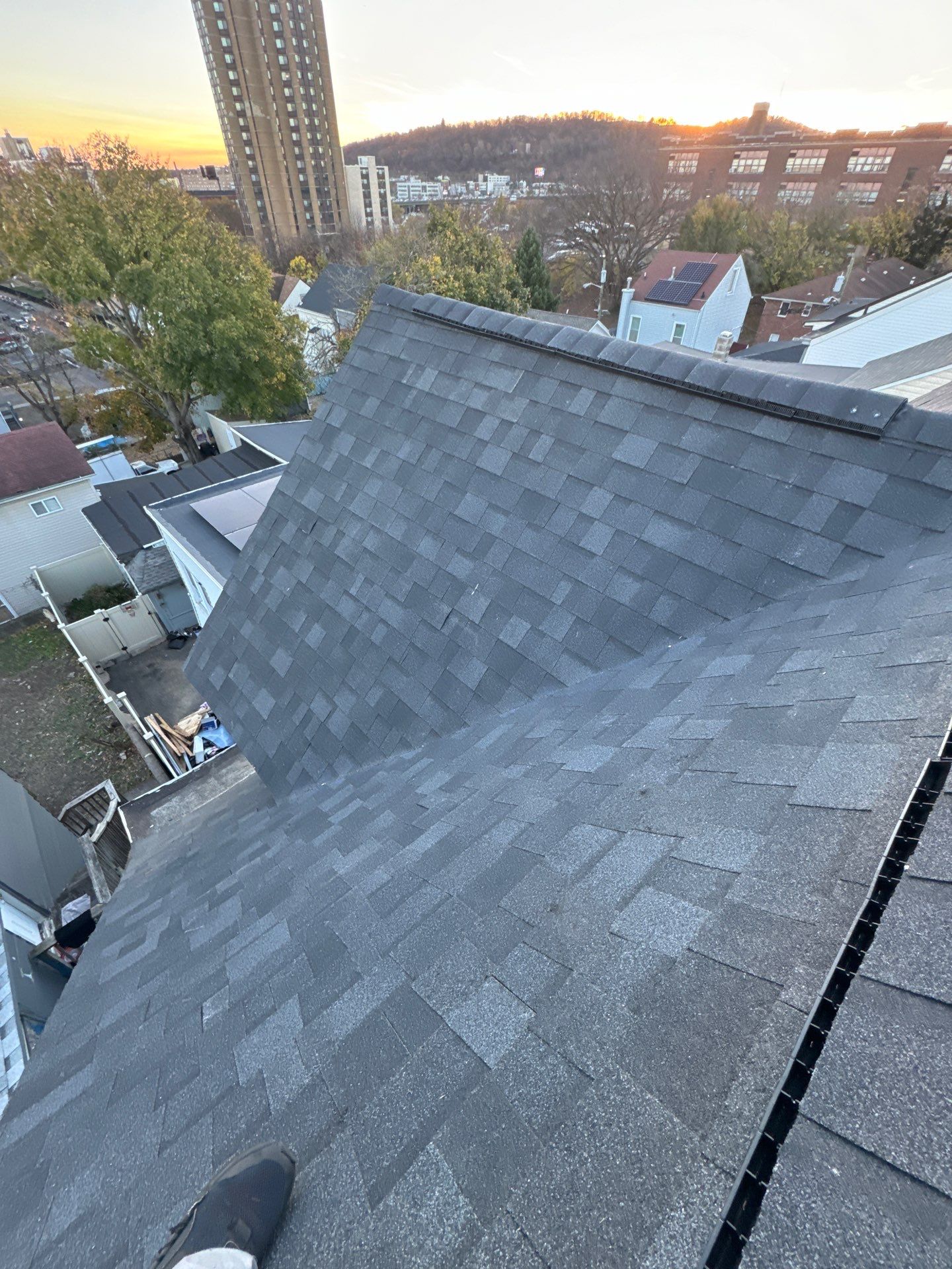 Estate Gray Shingles by Reimagine Roofing