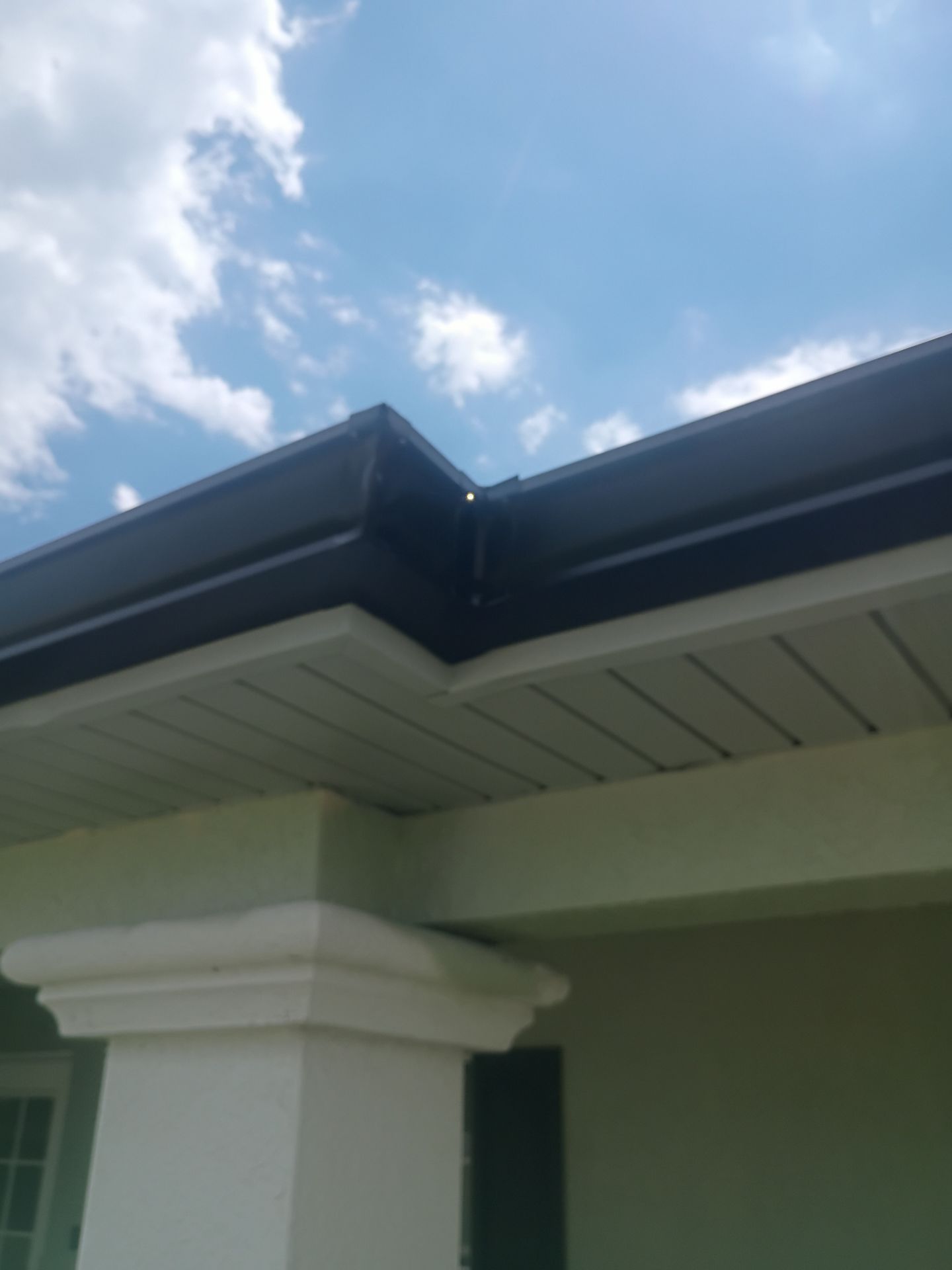 Black Seamless Gutters using K-Style Seamless Gutters in Cape Coral FL by Gutter Professors