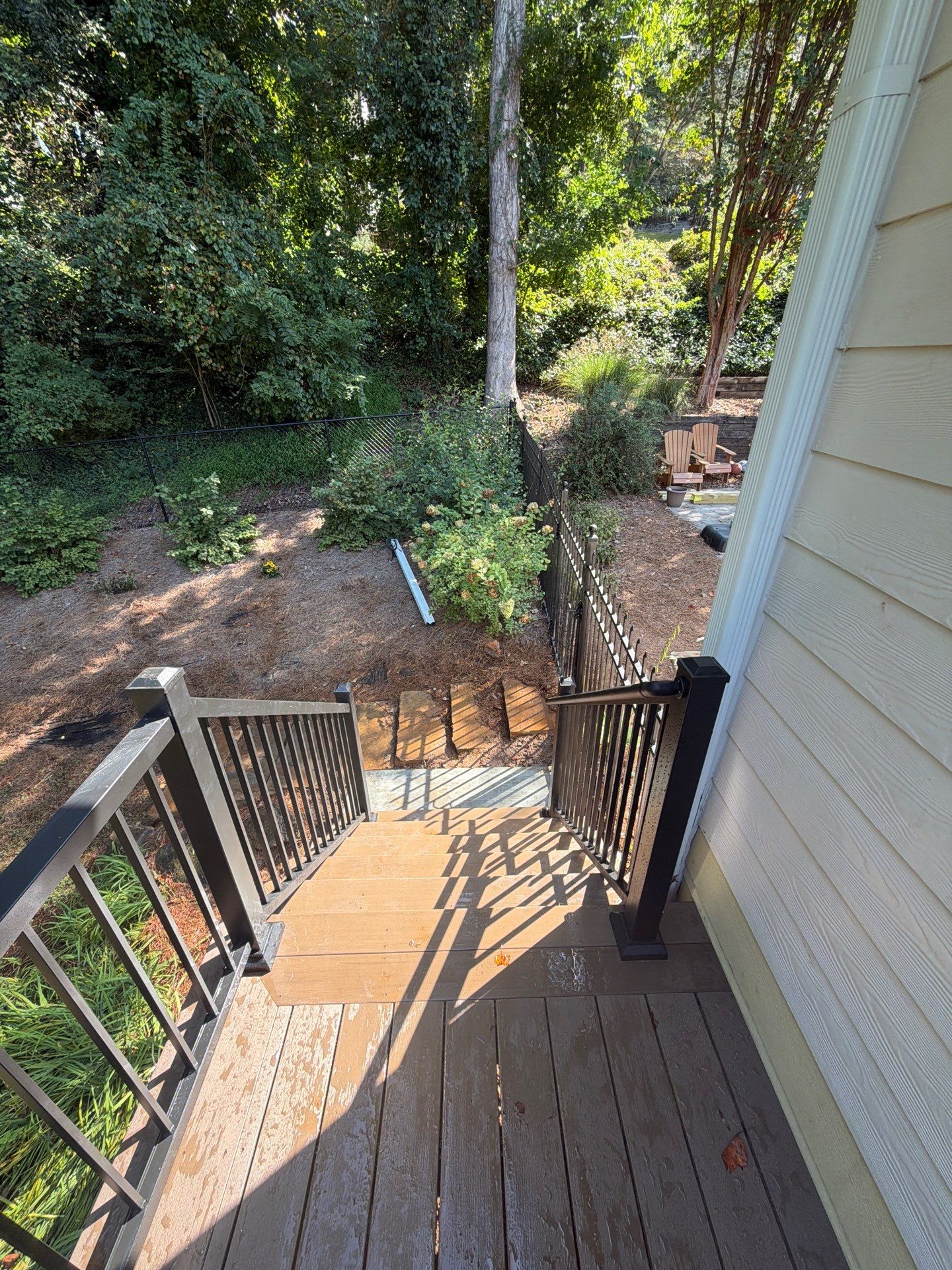Elevated Composite Deck Replacement with Metal Railings in Smyrna by Swift Home Renovations 