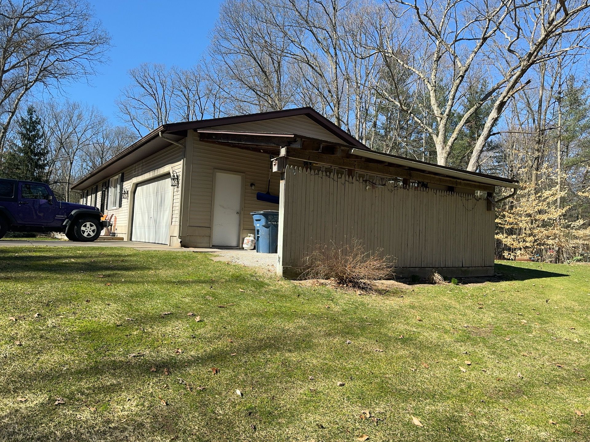 Siding, Deck and Versetta Stone by Avalon Roofing and Exteriors