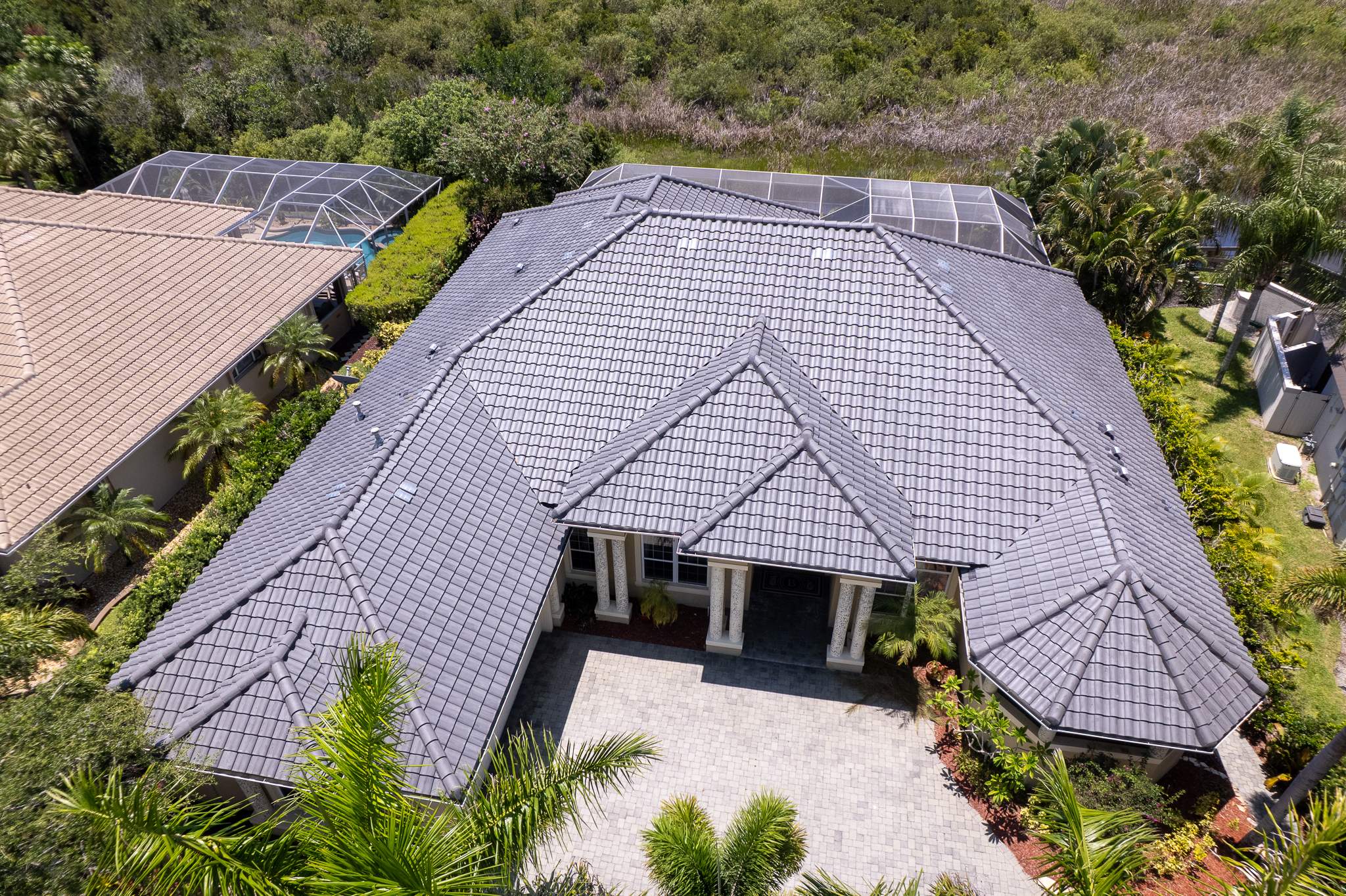 Residential Tile Roof Replacement with Skylight Integration in Melbourne by Wiedmann Construction & Roofing