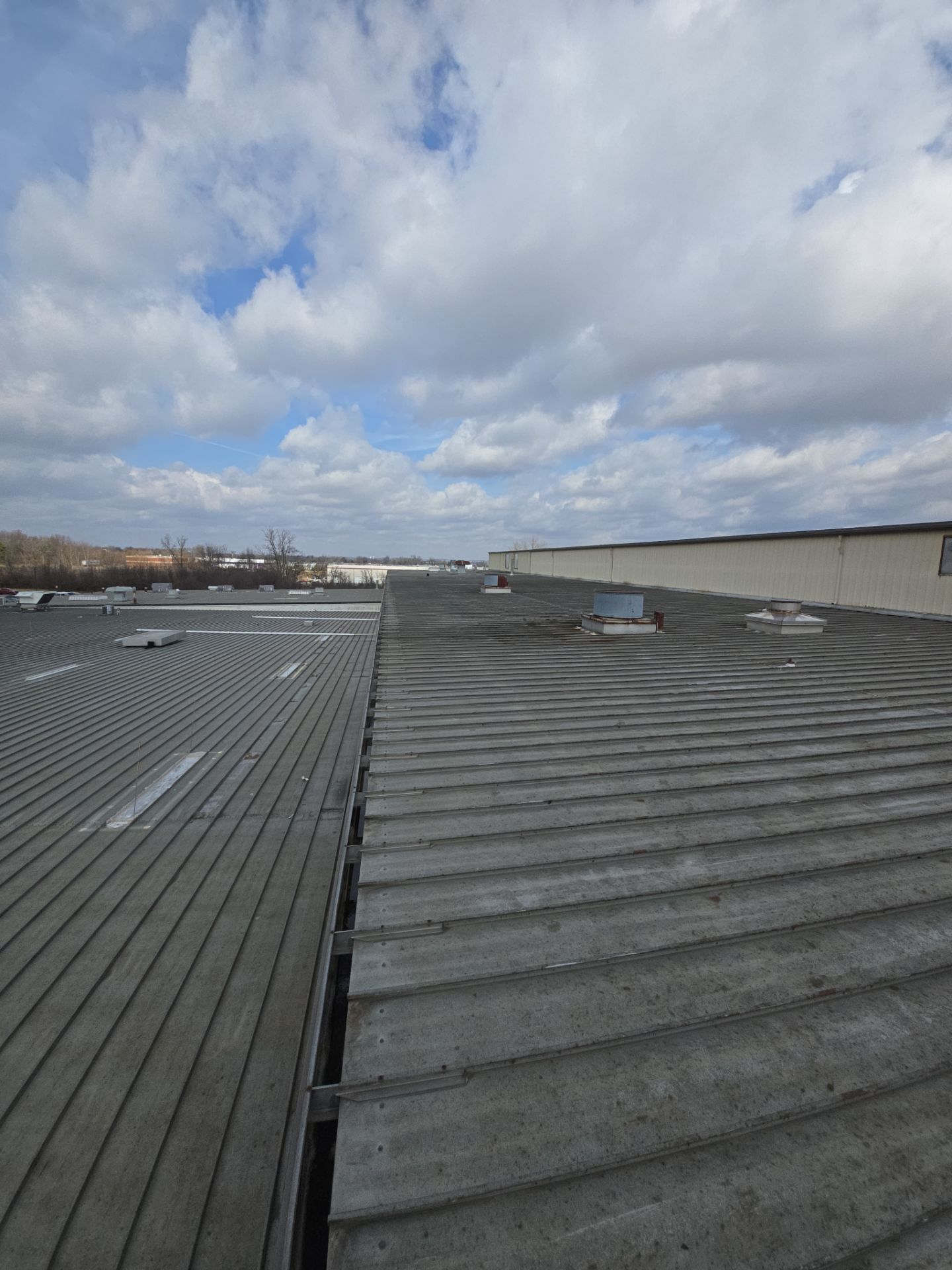 Commercial Metal and Flat Roof Repairs in Mason, Ohio by Level Up Roofing and Restoration Services LLC