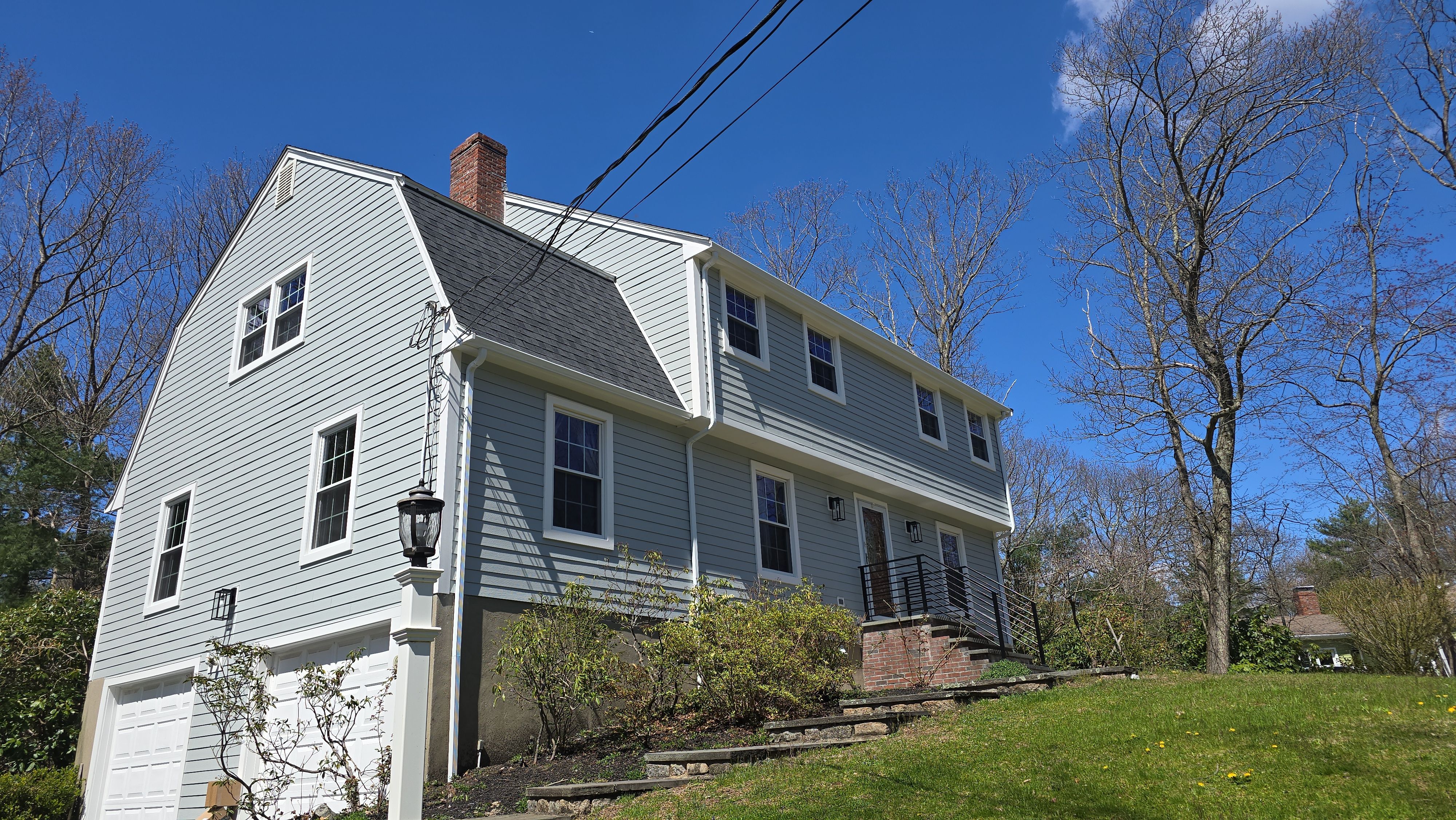 Custom window trim work and siding replacement in Dover, MA by UBrothers Construction