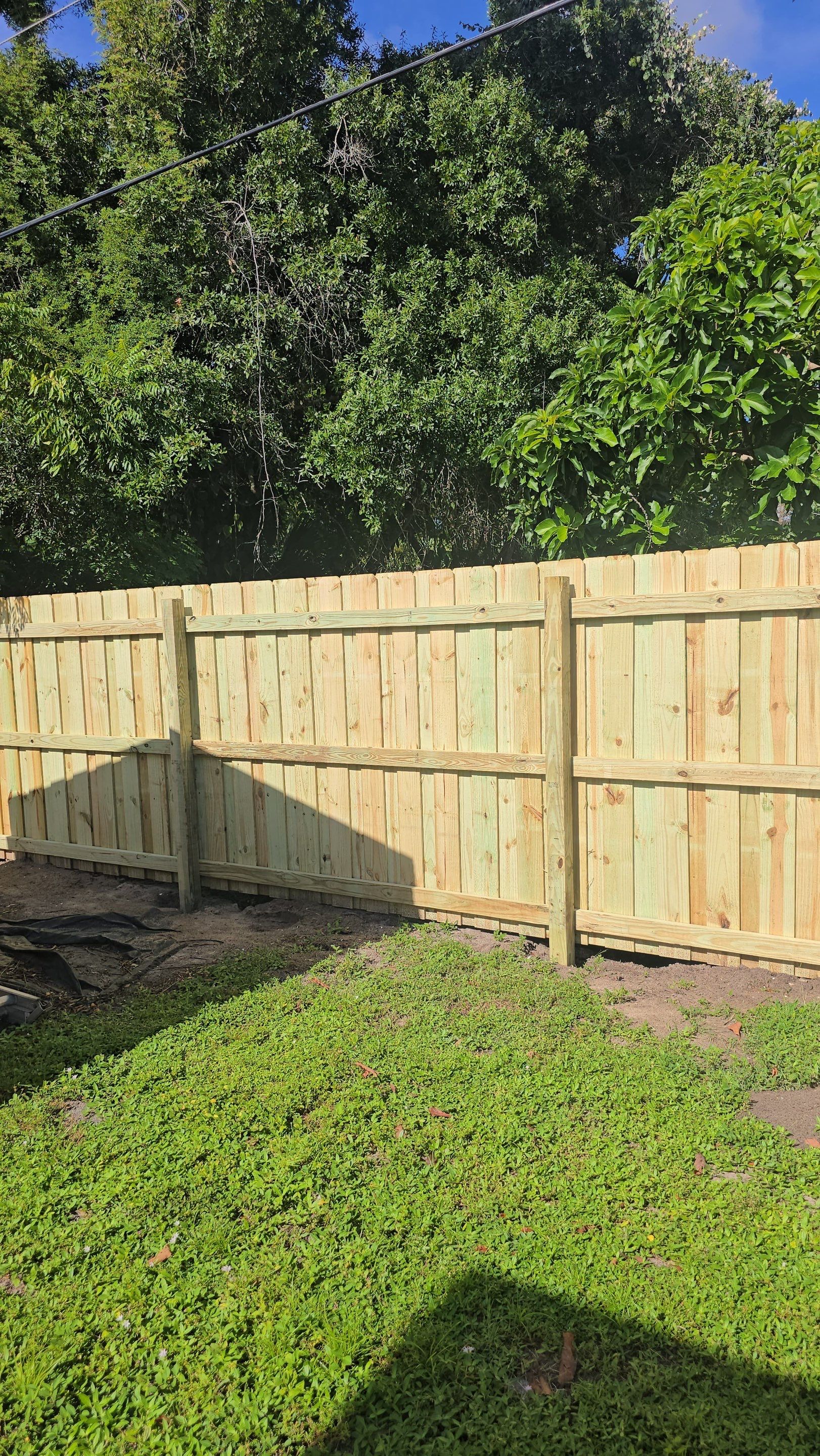 Pressure-Treated Wood Privacy Fence and Gate Installation in North Port by True Fence LLC