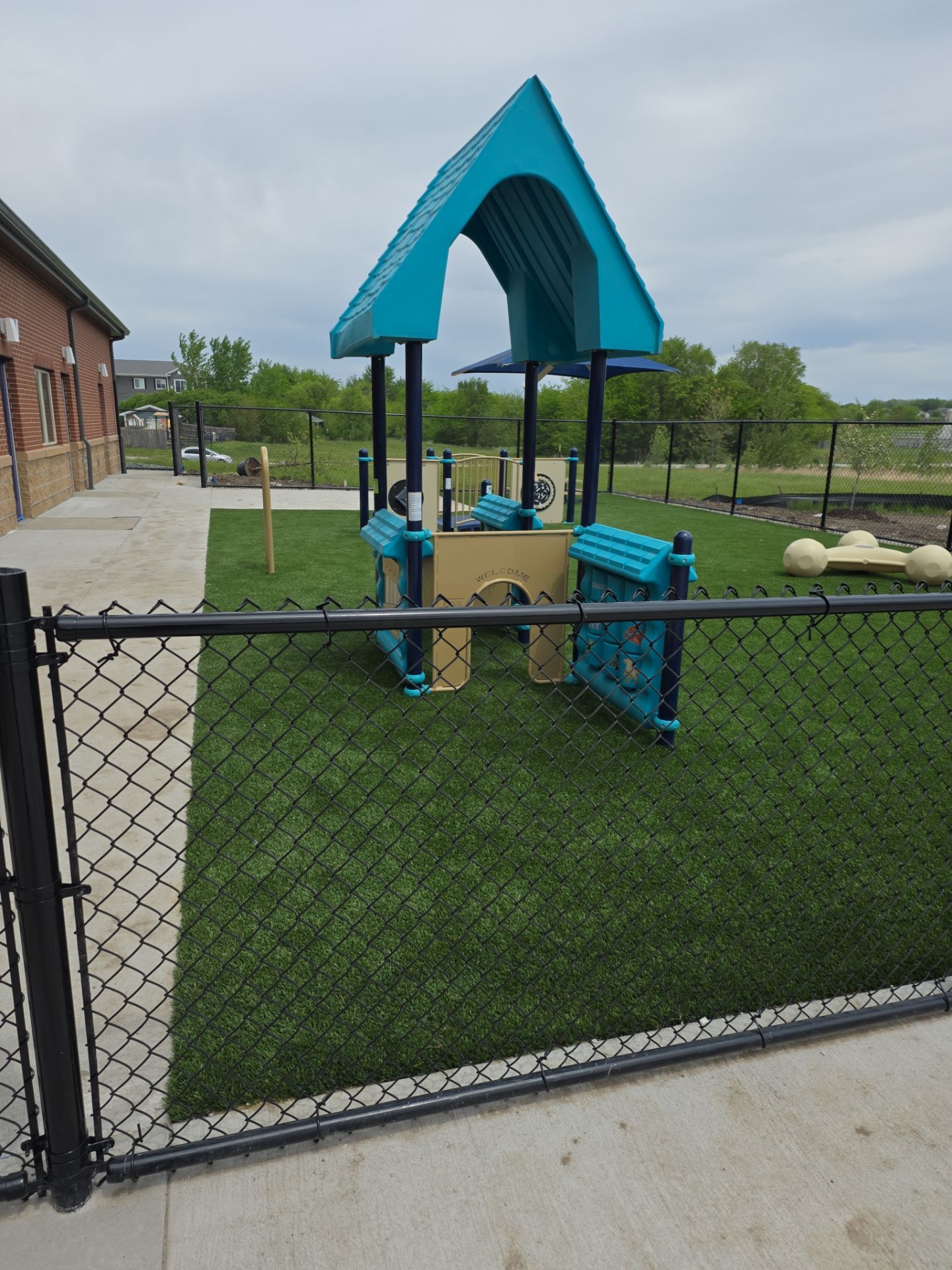 Everbrook in Grimes Playground Equipment & Turf by Southwest Greens Midwest