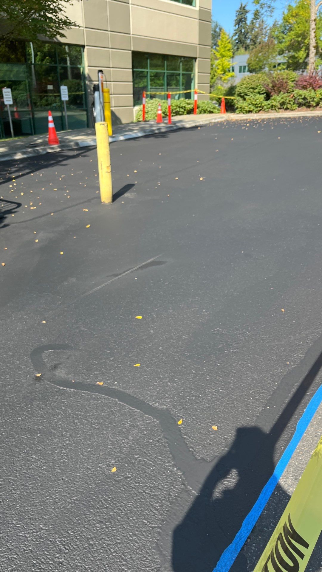 Kidder Matthews | Parking Lot Sealcoating & Striping with Concrete Curb & Patch Repairs  by Jireh Asphalt & Concrete Inc 