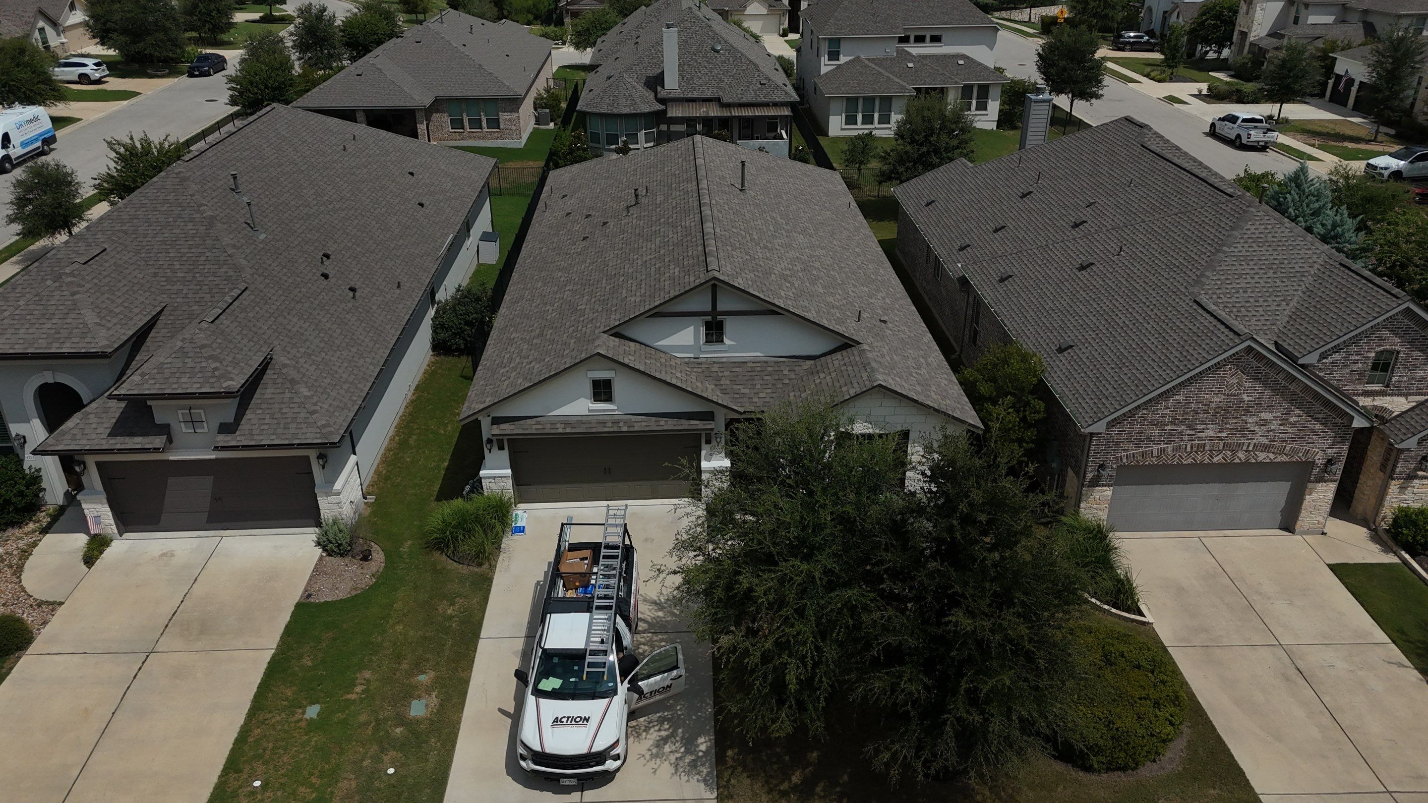 Residential Roof Replacement using Malarkey - Vista AR - Weathered Wood Plus by Action Exteriors Austin