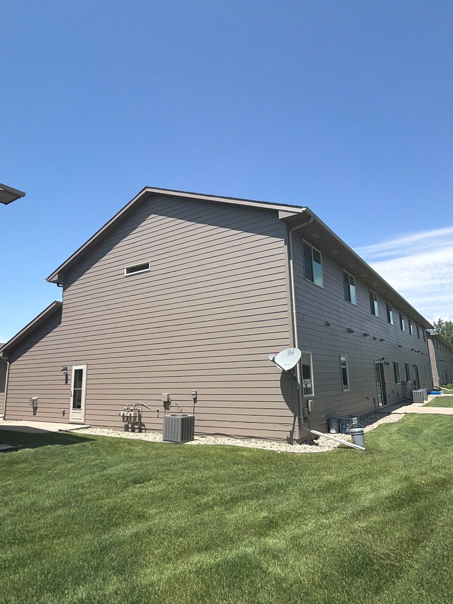 Multi-Family Exterior Painting and Trim Refresh in Sioux Falls by Select Painting, Coatings & Garage Cabinets