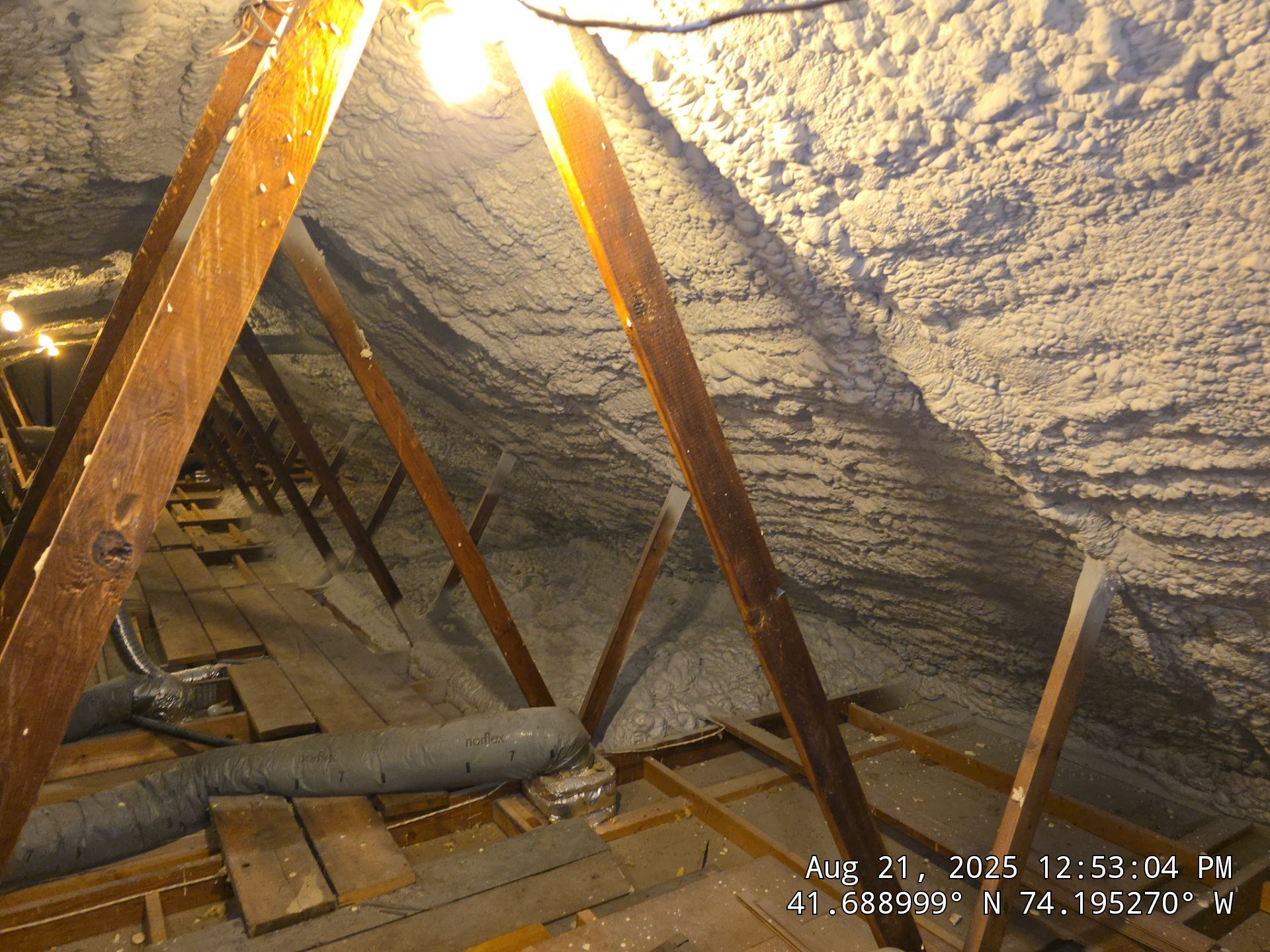 Attic Insulation using open cell spray foam by NYS Foam & Energy