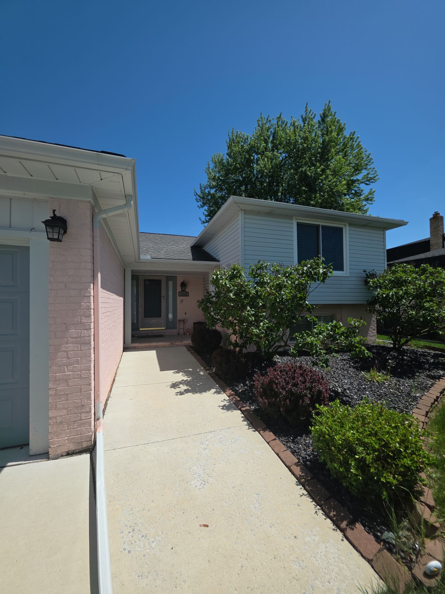 Modern Exterior Painting and Brick Staining in Sterling Heights by Top Shelf Painter