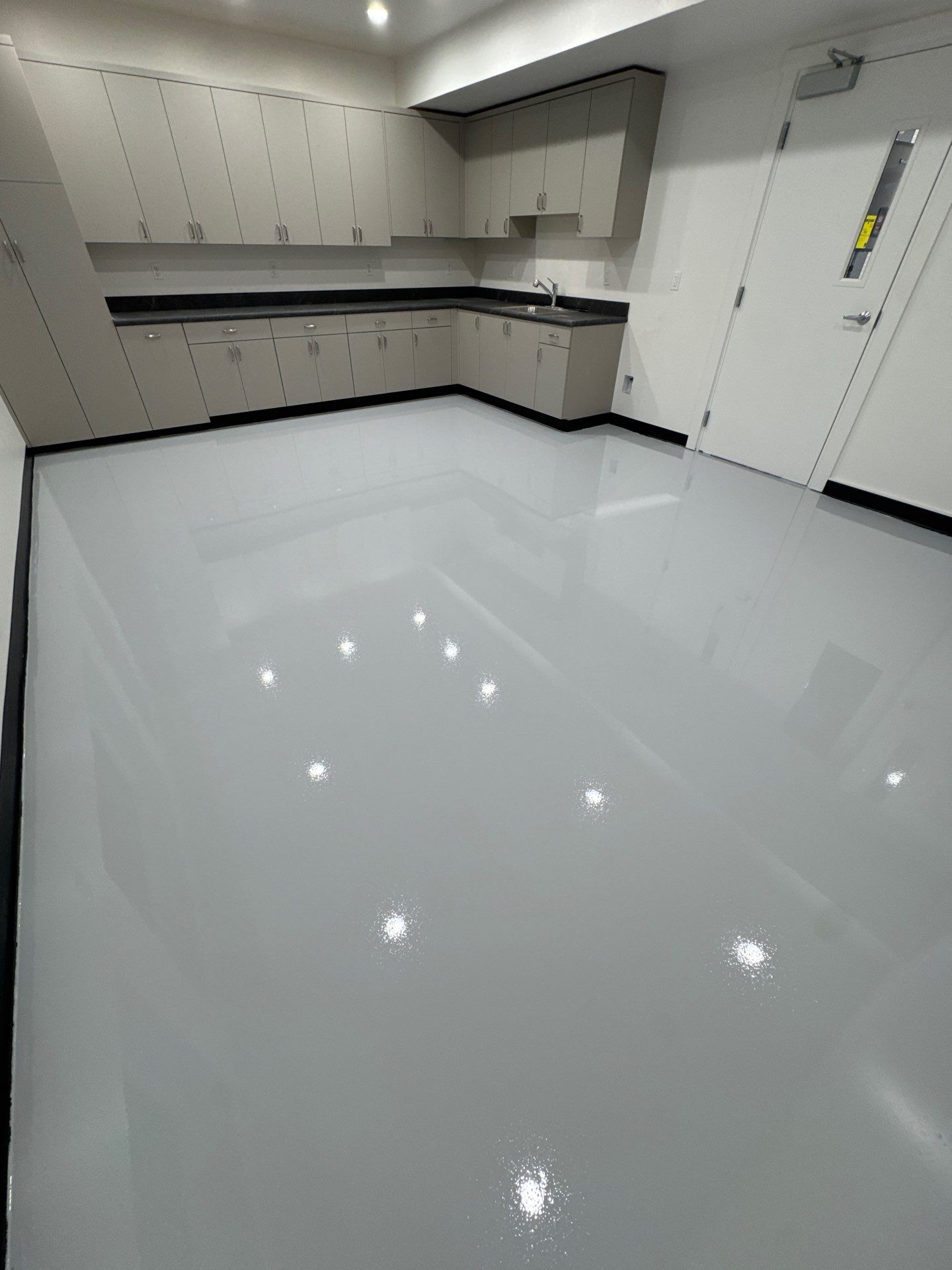 Colfax Commercial Shop Transformation With Vapor Mitigating Floor Coatings by Croc Coatings, LLC