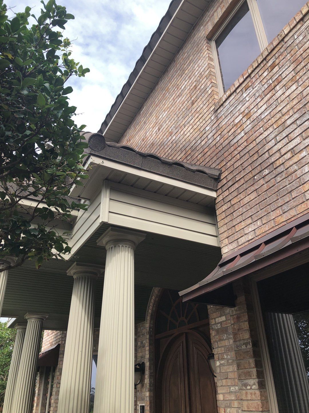 Seamless Gutter Installation with Wicker Color K-Style Gutters and LeafBlaster Pro Mesh Gutter Guards by Gutter Professors