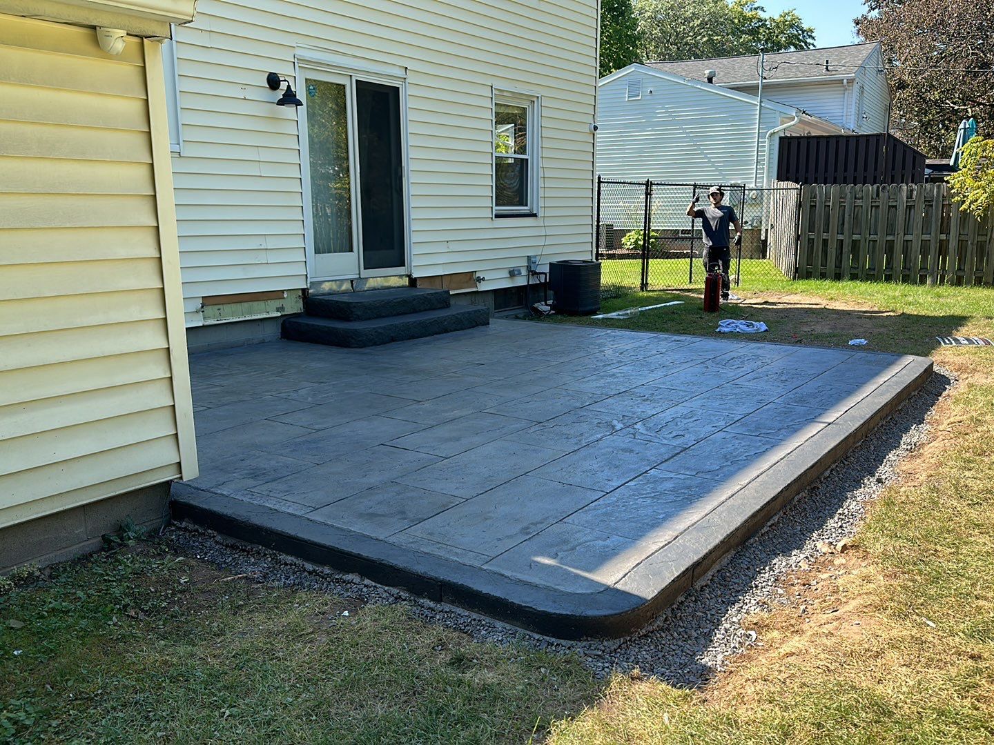 York Bluestone stamped patio by NG Masonry & Construction LLC