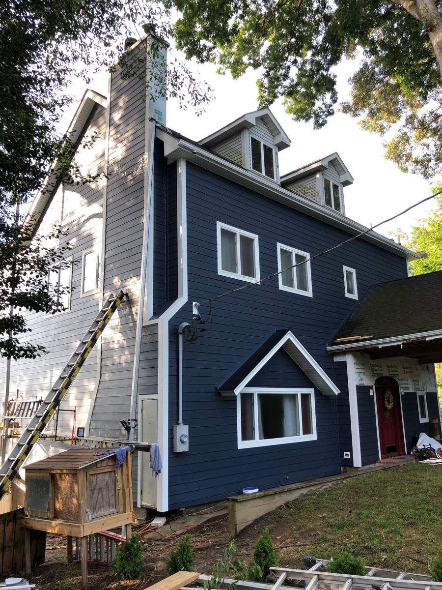 Siding Installation using JH Batten Smooth and JH Cedar Mill Plank by ExteriorPros