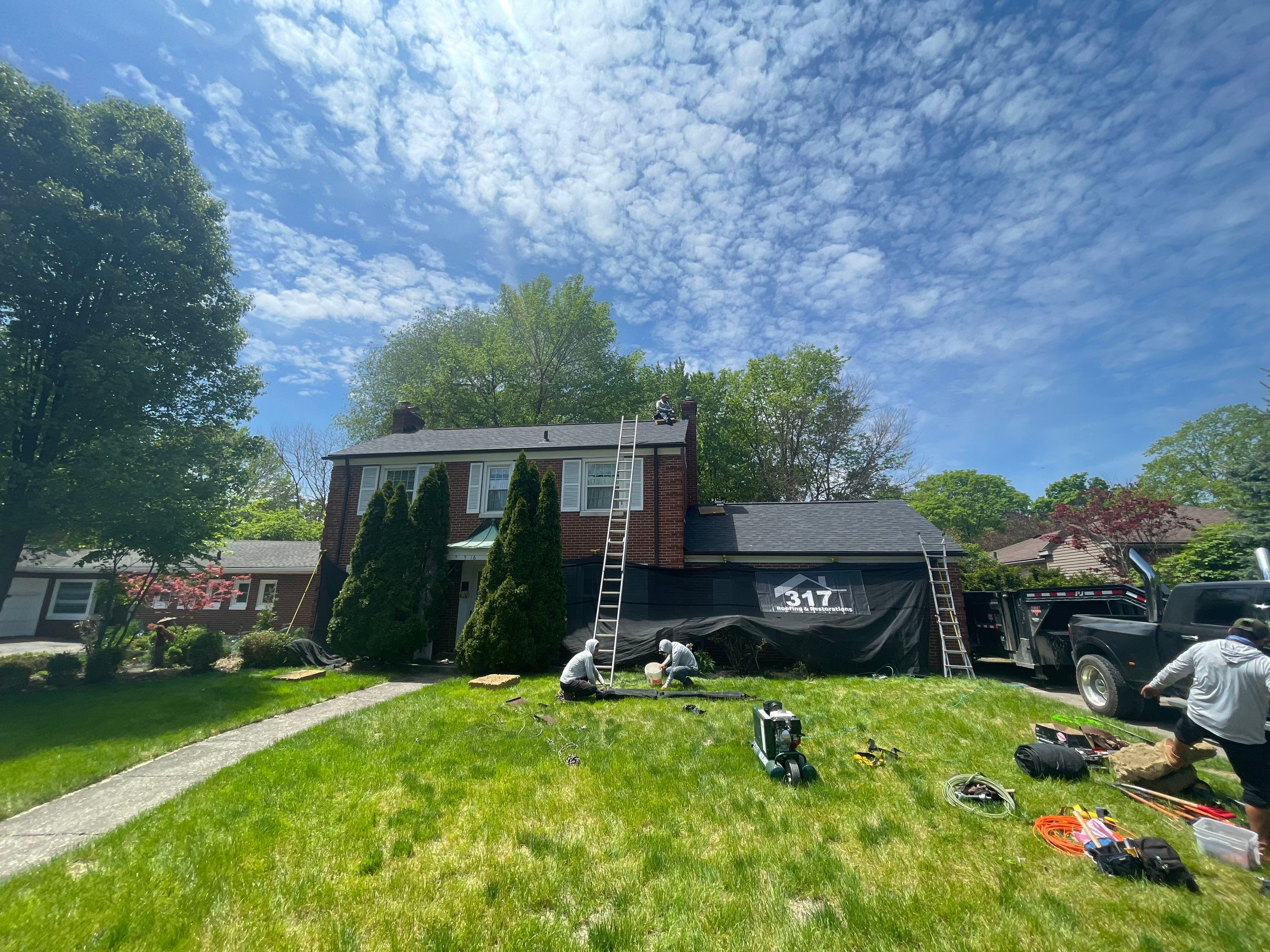 Oakridge Onyx Black and Black Gutters by 317 Roofing & Restorations