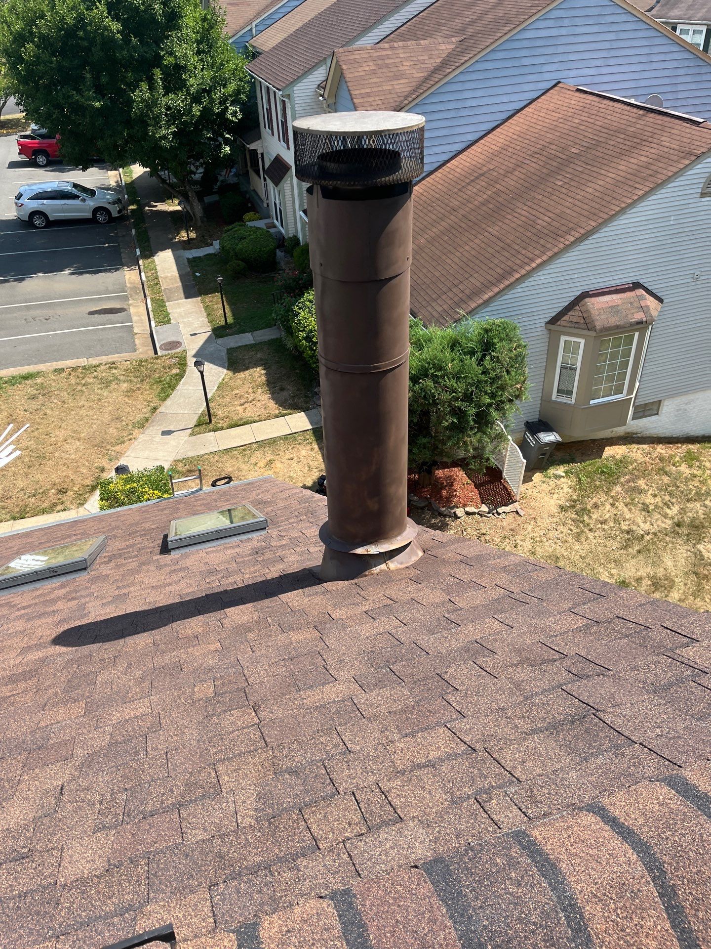 Montclair: Roof Installation with CertainTeed Landmark Designer Shingles in Burnt Sienna by RM Banning, Inc.