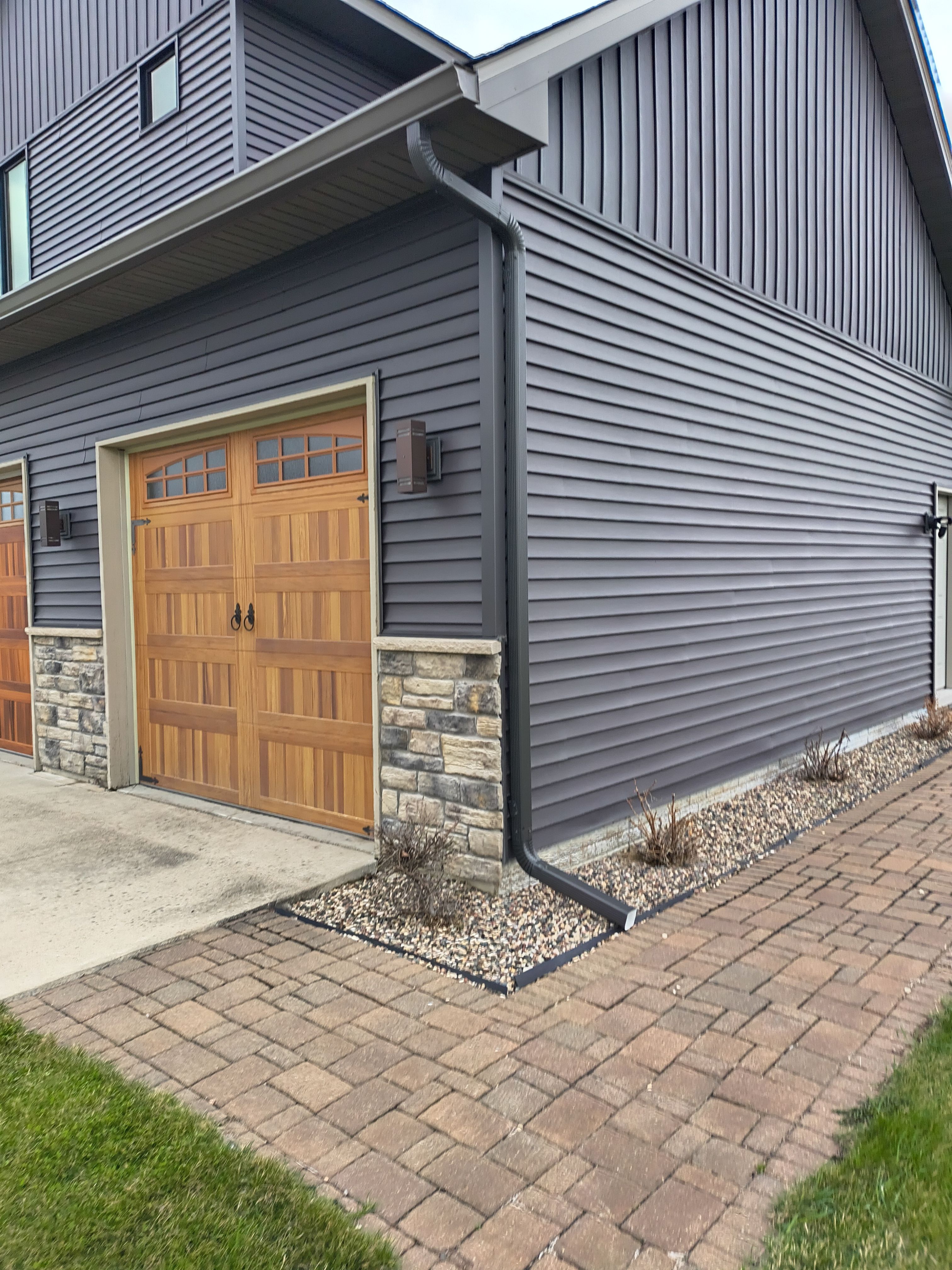 Seamless Gutter Installation in Waverly MN | 6” Gutters & Black Screen Gutter Guards by Next Level Seamless Gutters / Exteriors Inc.