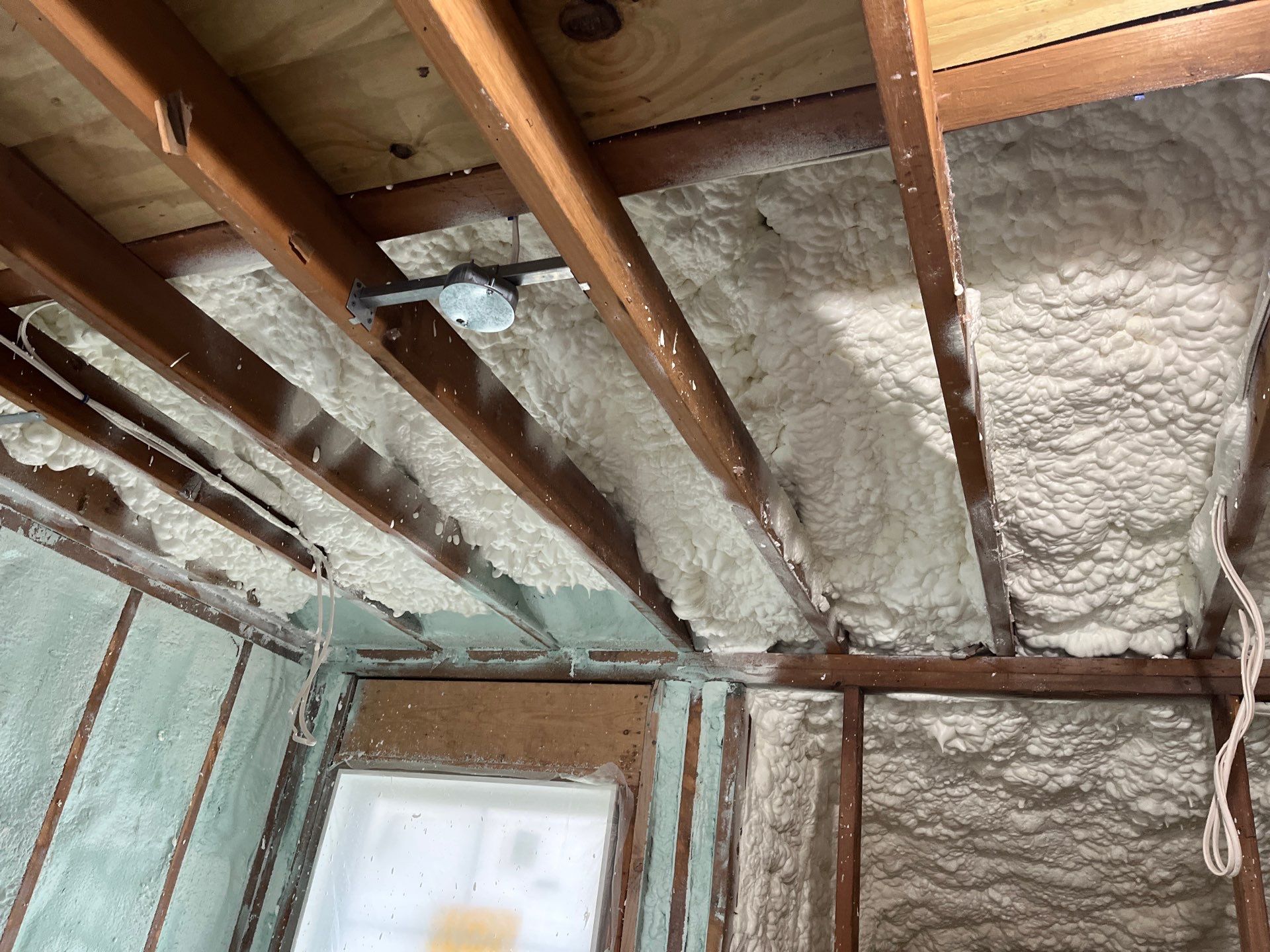 Basement Exterior Walls using Closed Cell Spray Foam by NYS Foam & Energy