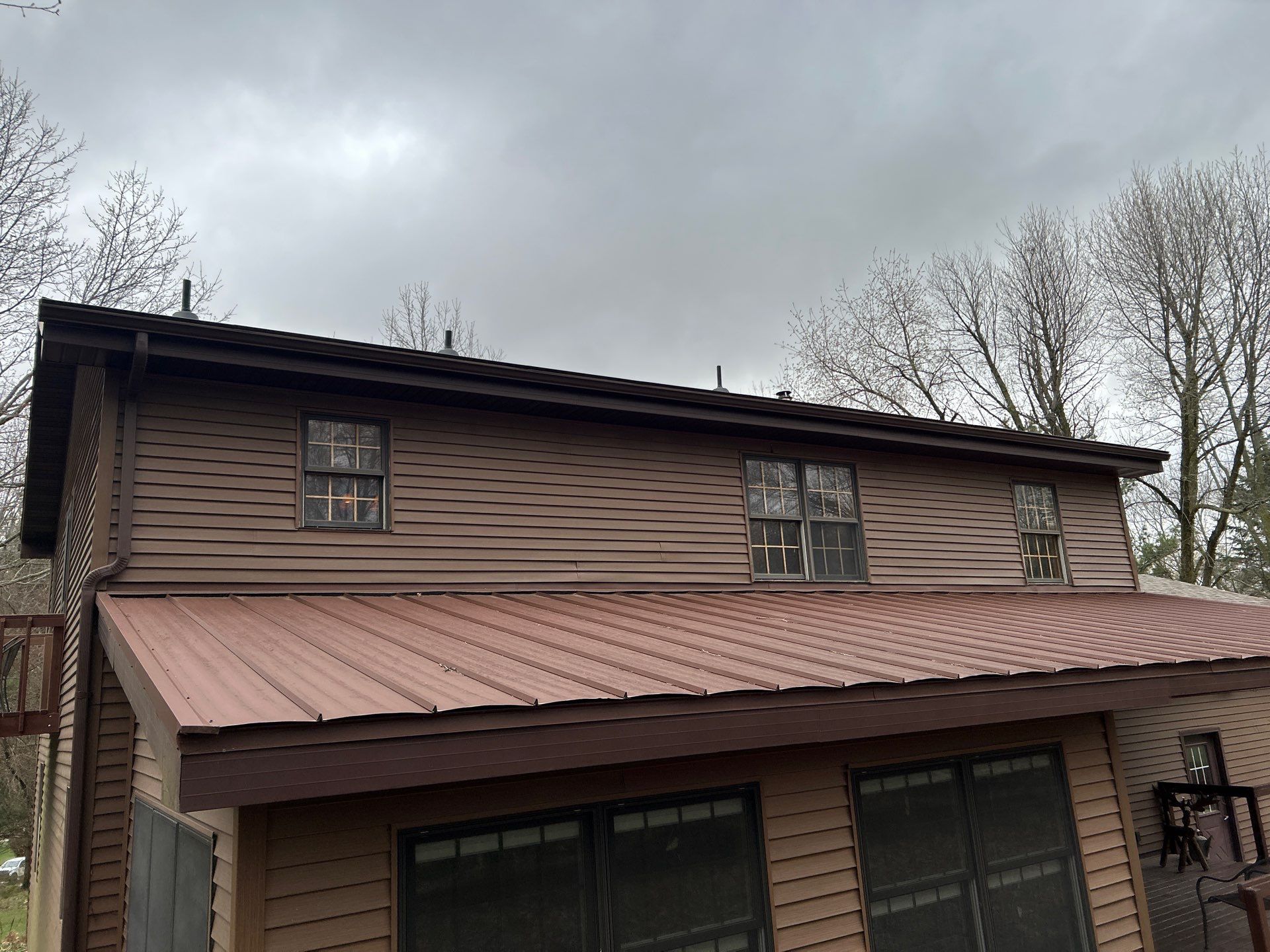 Pella Window installation using Pella Lifestyle wood/Aluminum window by United Windows and Siding LLC