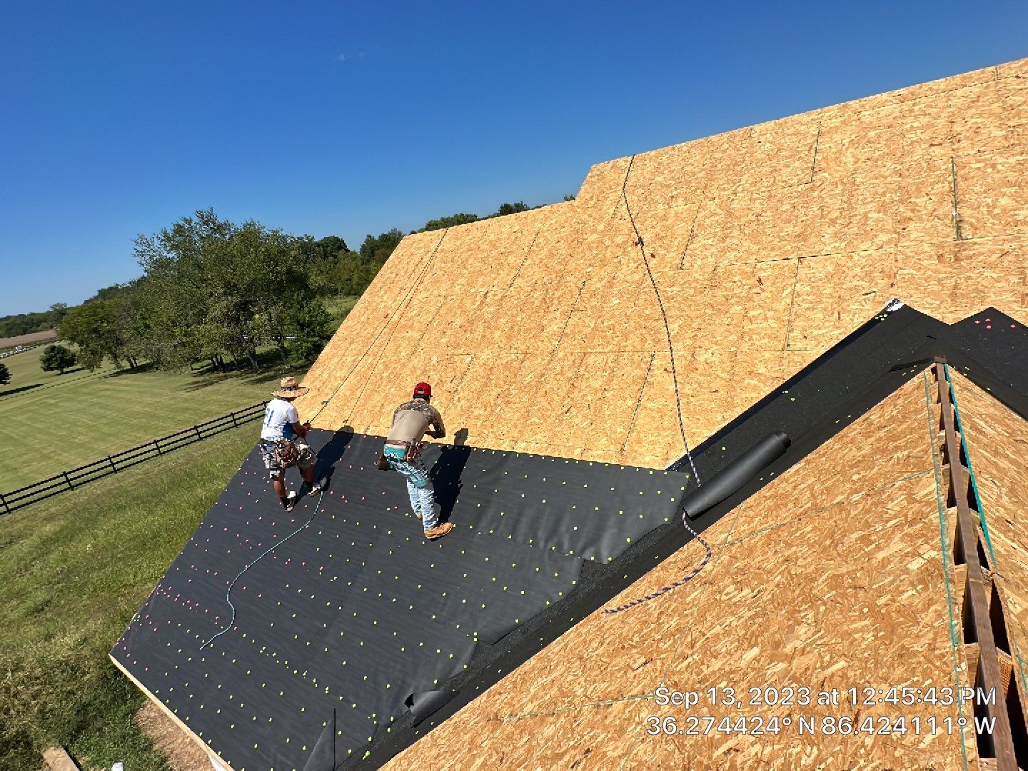 Residential Roofing Installation using Tamko Heritage AR with Standing Seam Metal Porch by Undersun Roofing 