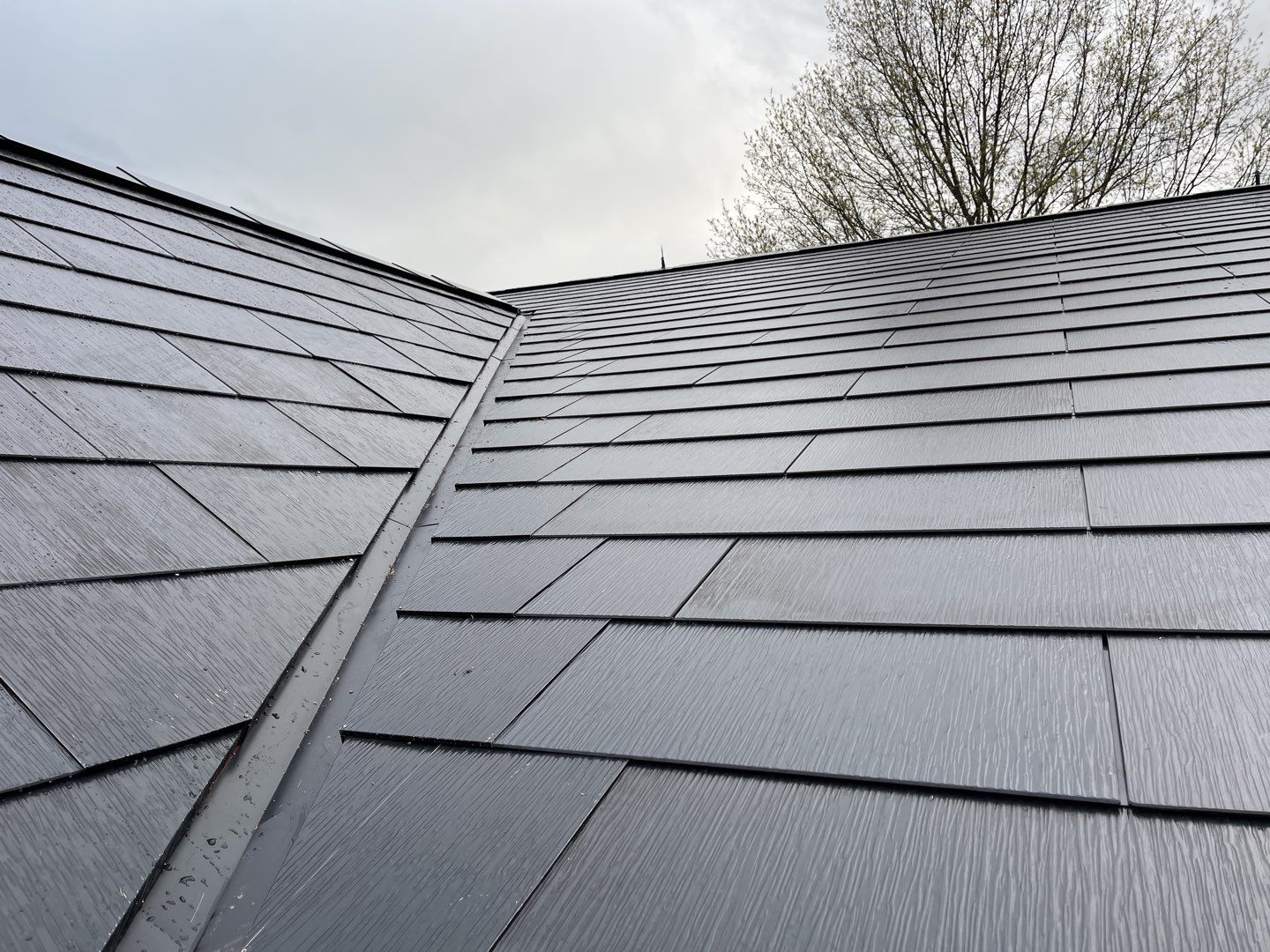 Tesla Solar Roof Replacement by American Home Contractors