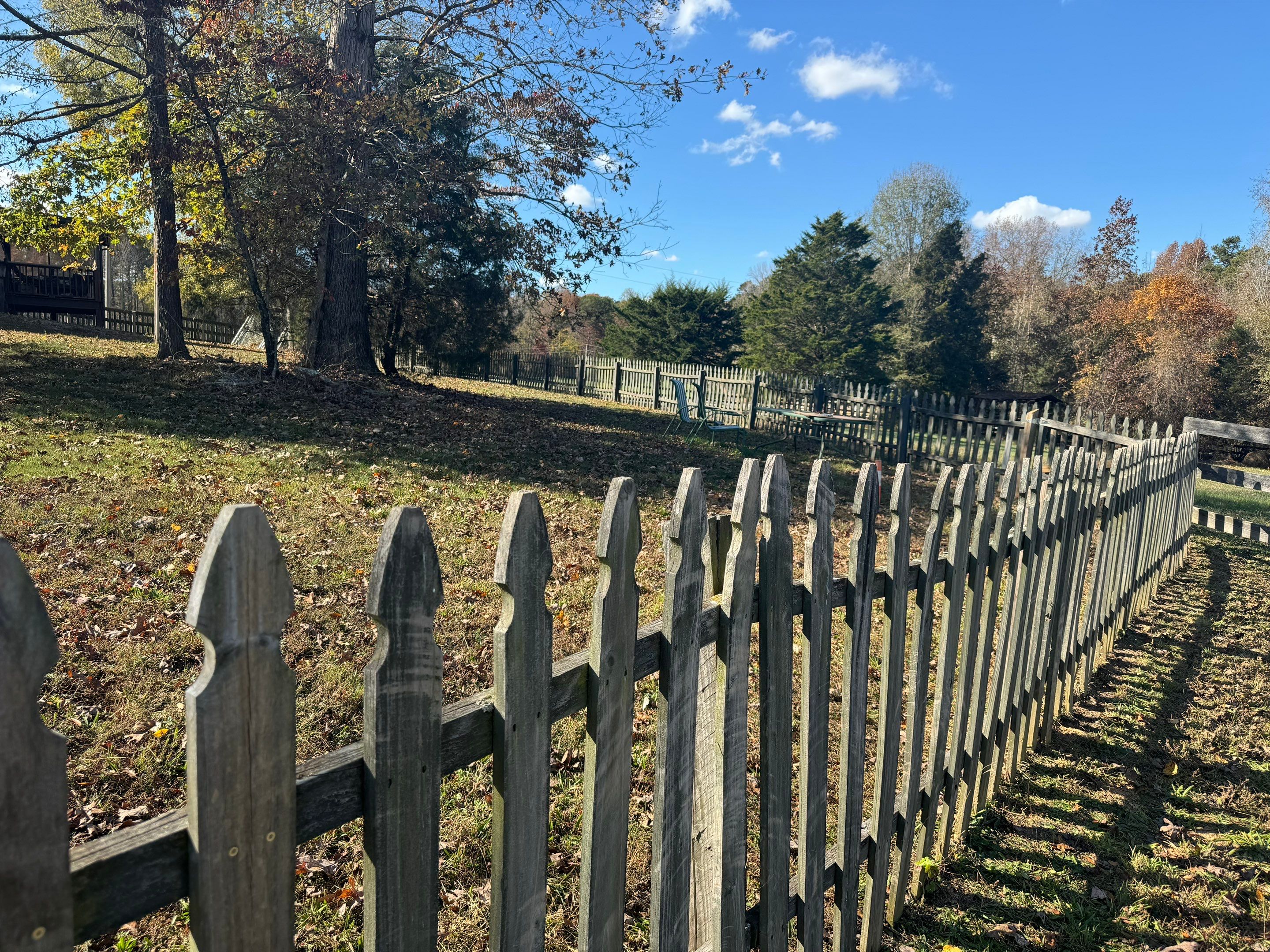 Fence Staining (Farm in Durham NC) by GonzalezPainters & Contractors Inc 