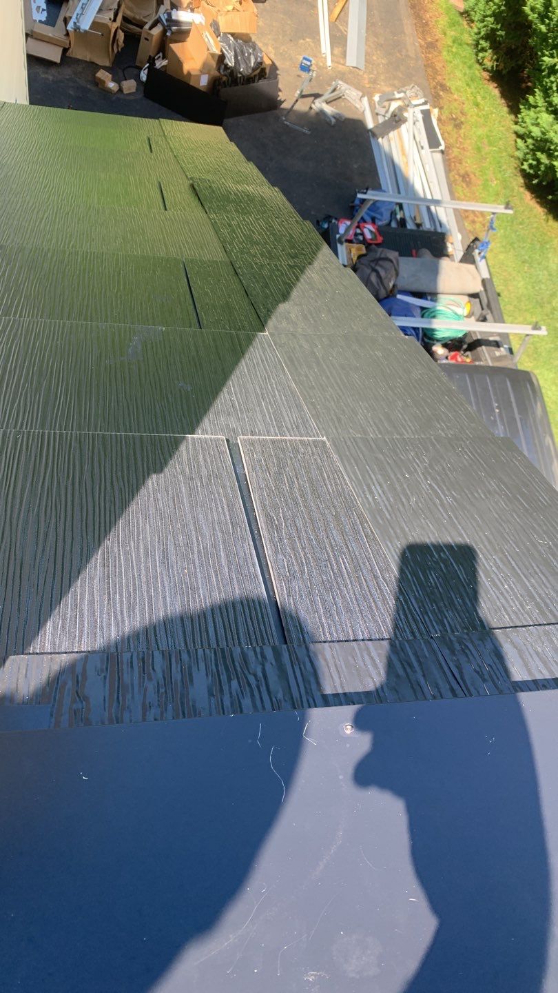 Tesla Solar Roof Replacement using Tesla Solar Roof V3 tiles by American Home Contractors