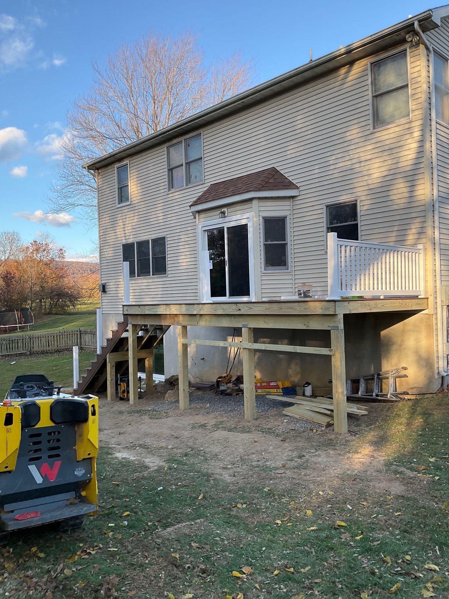 Patio door replacement and deck upgrade by Esh Builders