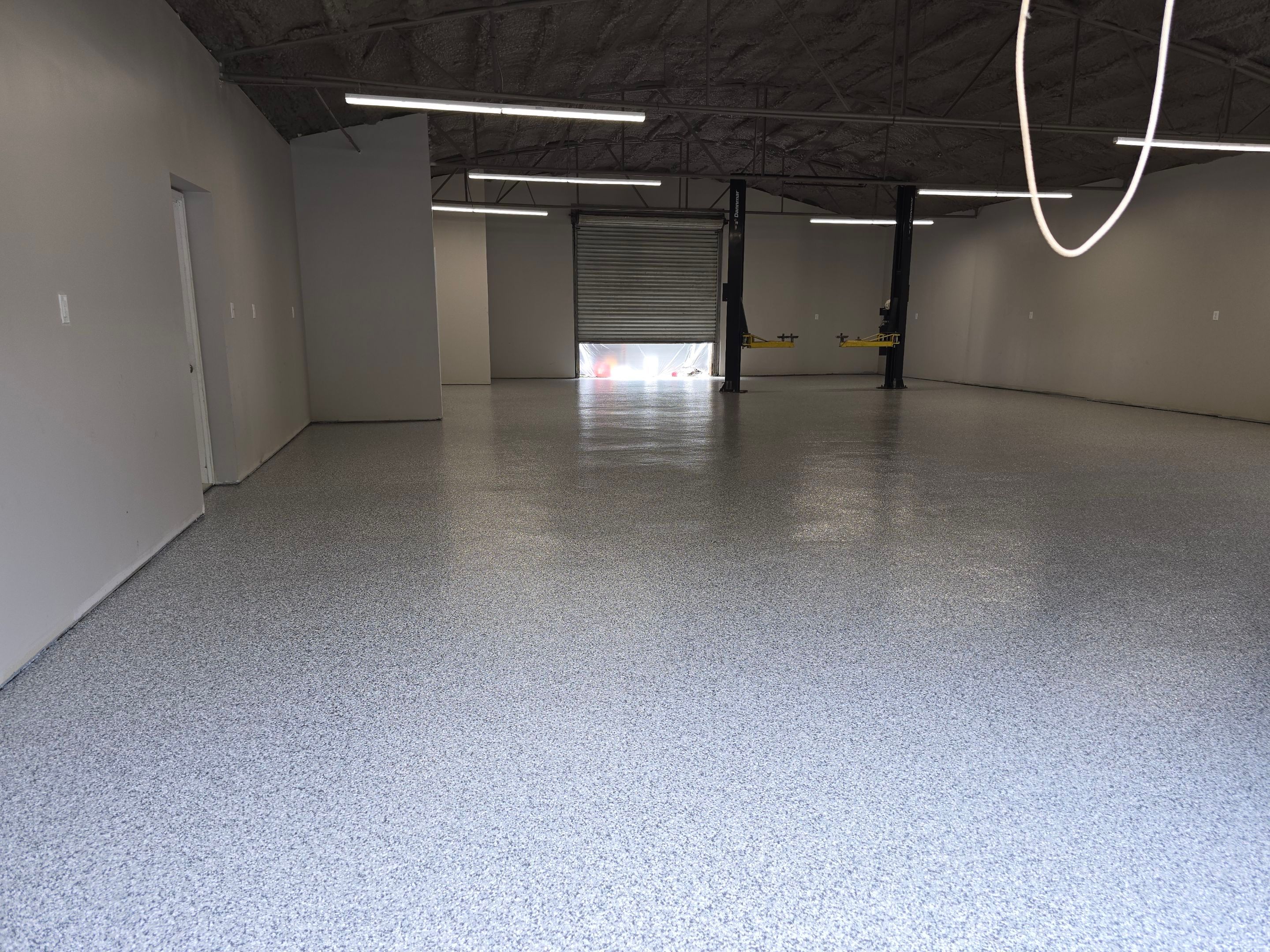 Super old and oily concrete brought back to life by Elite Floor Solutions