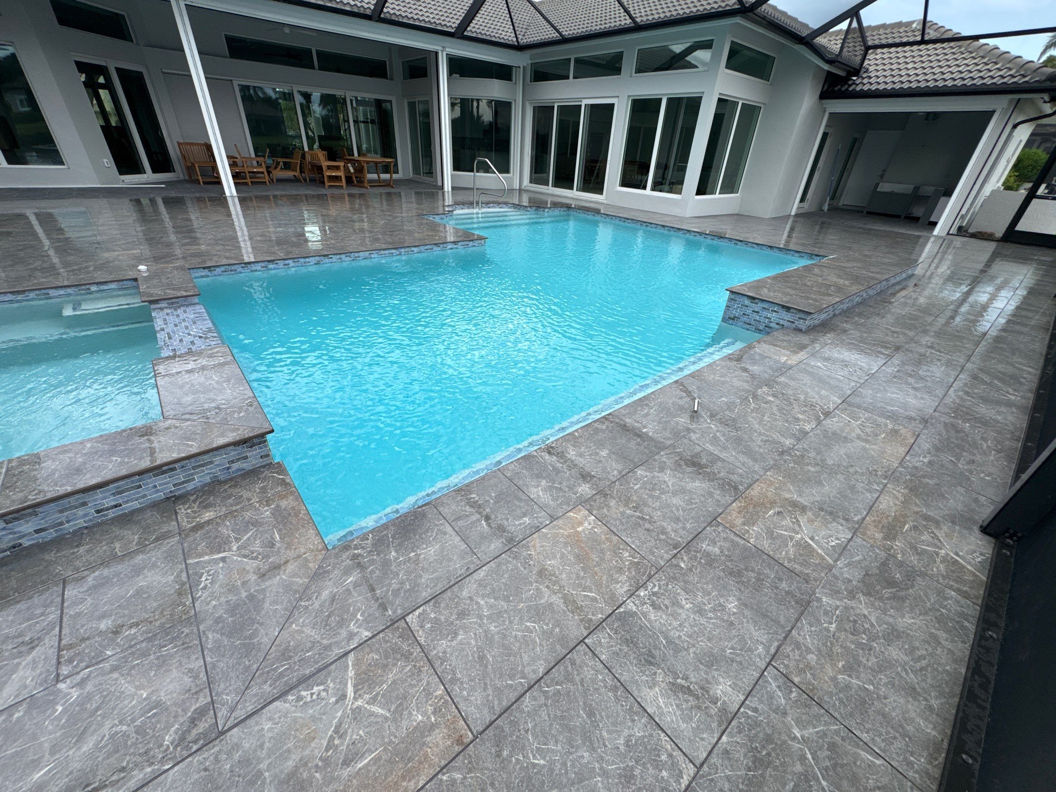 Pool Renovation/Porcelain pavers/Wild Cat Run by Old Town Pavers Llc